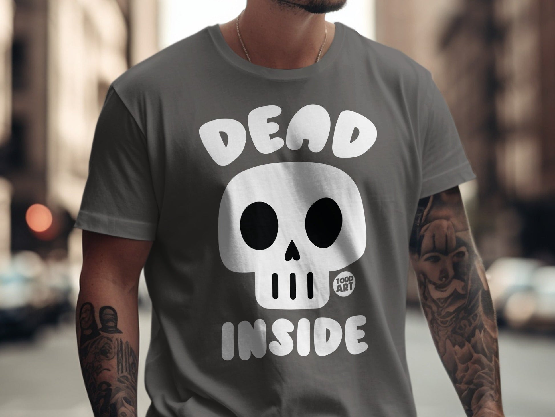 Gray t-shirt with a white skull graphic and "DEAD INSIDE" text.