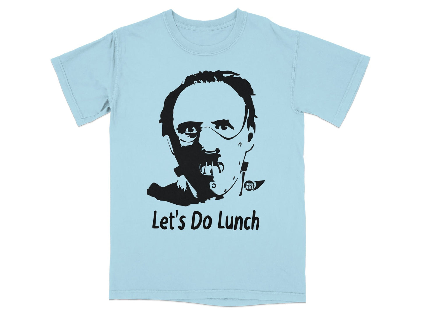 Light blue t-shirt with a black graphic of a face and the text "Let's Do Lunch".