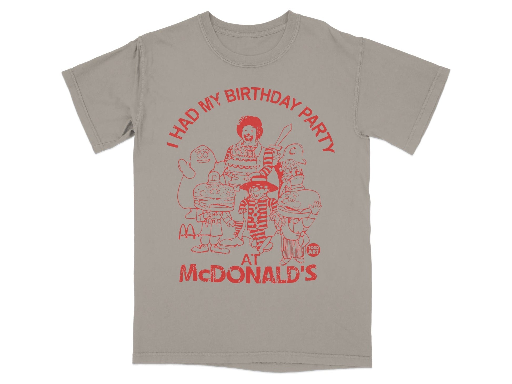 T-shirt with red graphic of Ronald McDonald and friends at McDonald's.