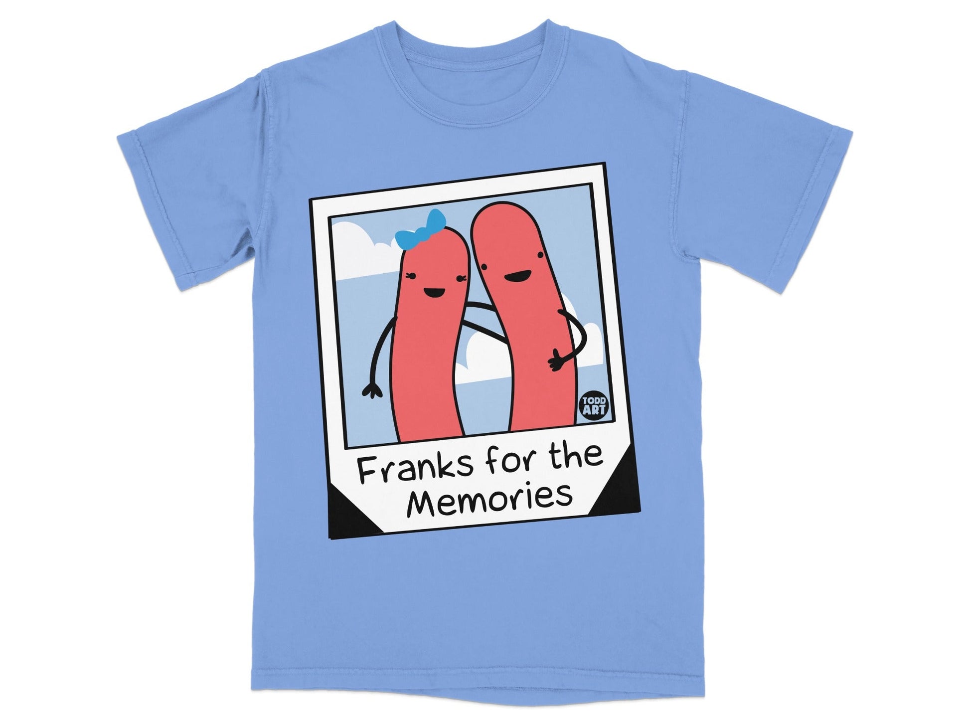 Two hot dogs with a "Franks for the Memories" graphic on a blue t-shirt.