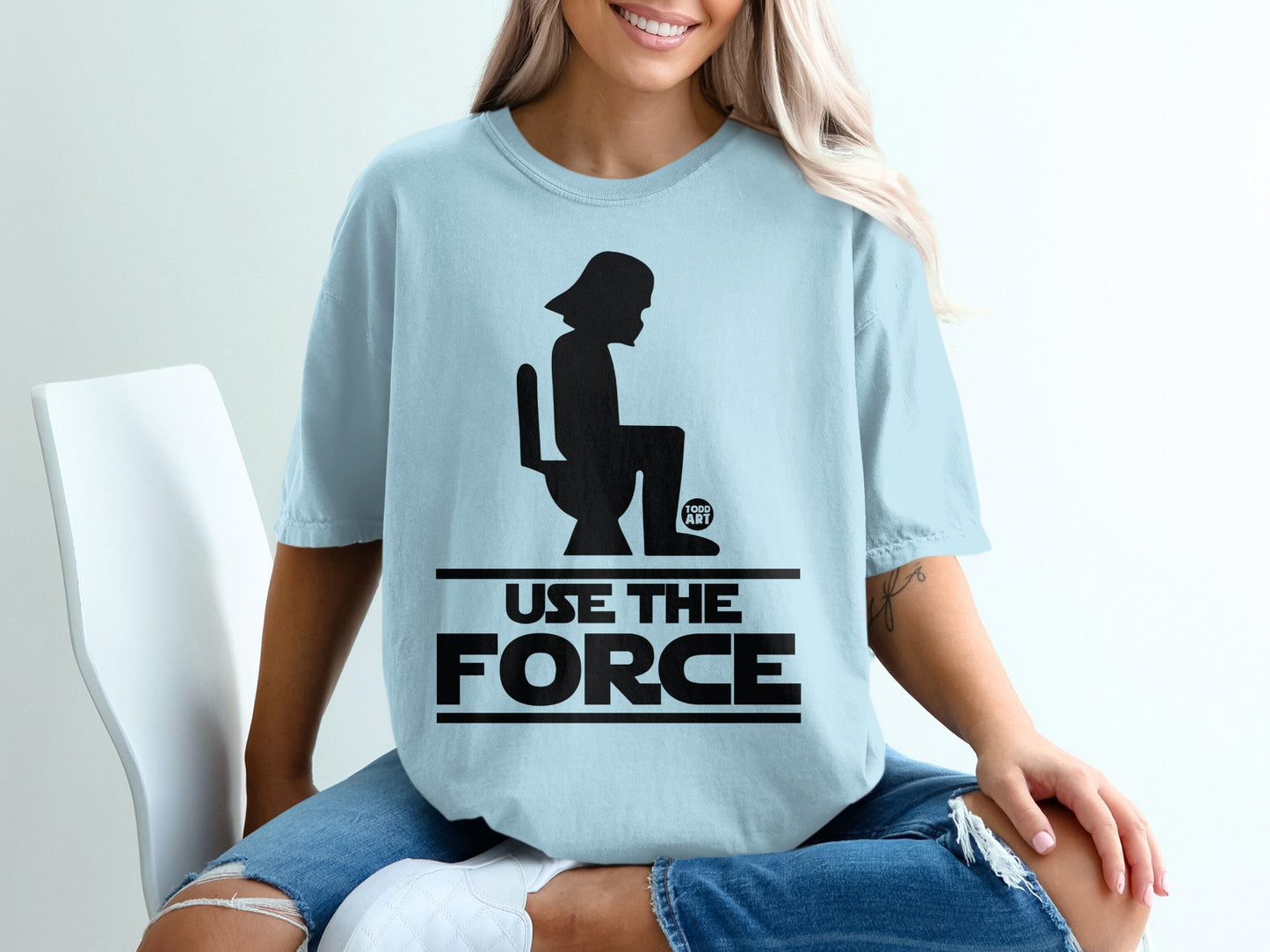 Light blue t-shirt with Darth Vader silhouette on a toilet, "USE THE FORCE" text.