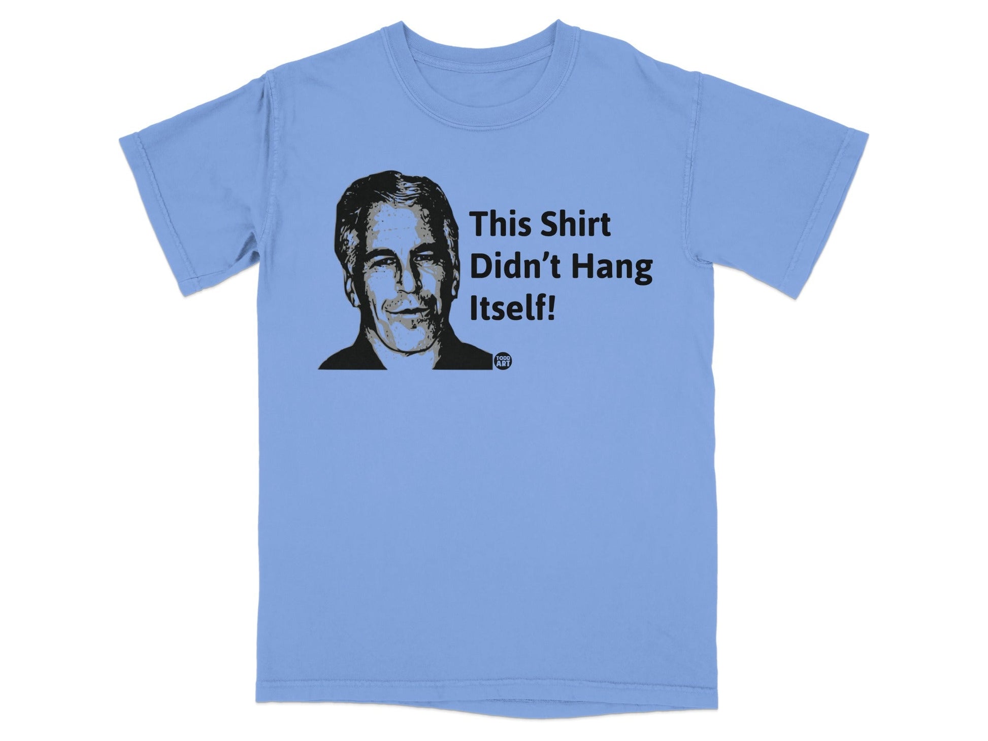 Light blue t-shirt with a black graphic of a man and the text "This Shirt Didn't Hang Itself!".