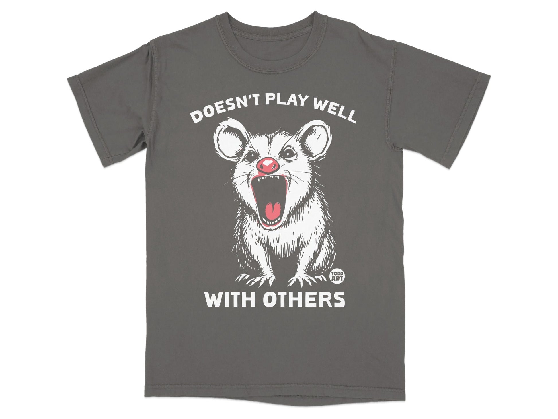 Graphic tee with a screaming opossum and text that reads "Doesn't Play Well With Others."