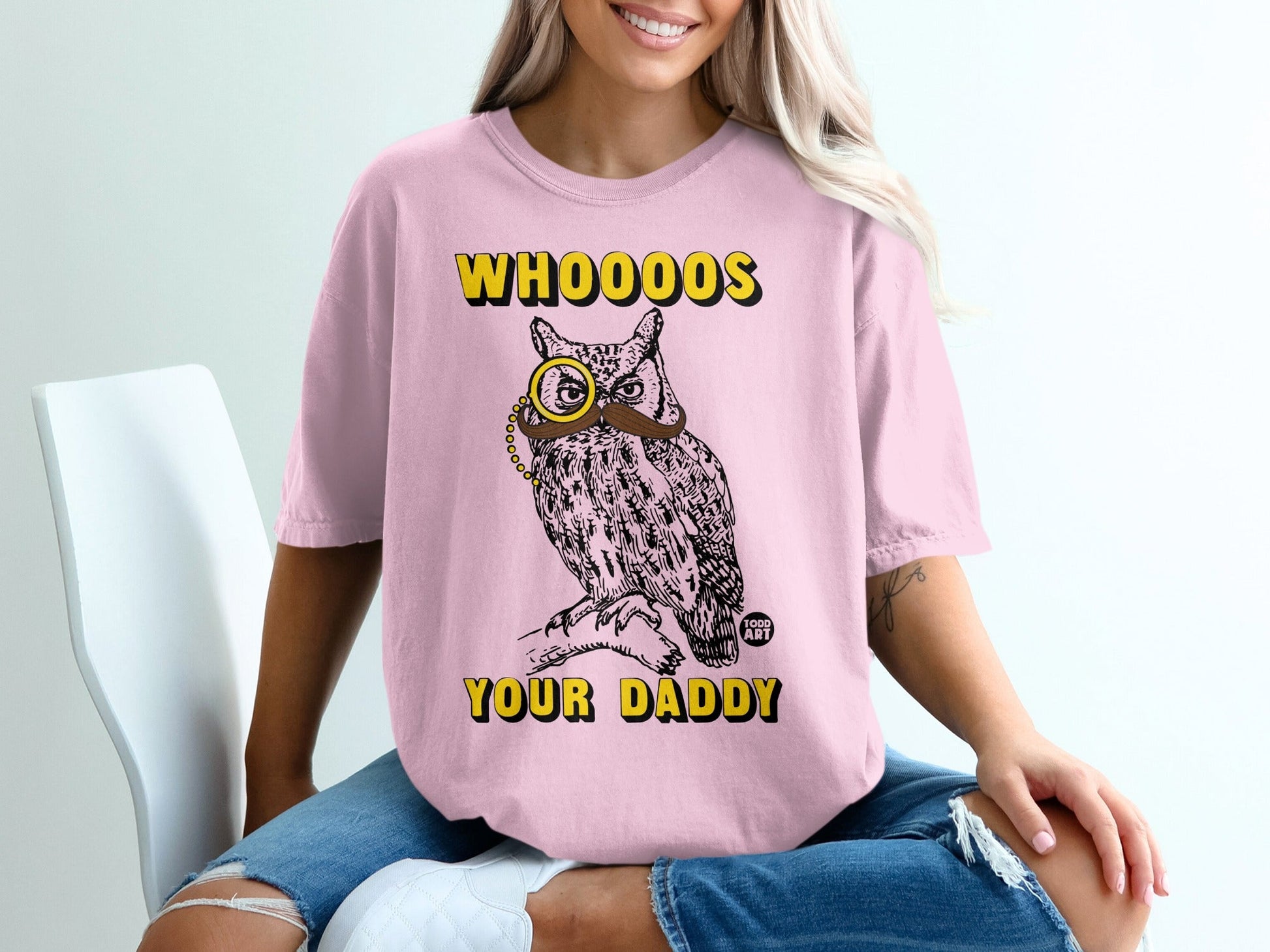 Pink t-shirt with owl wearing monocle and mustache, text "WHOOOOS YOUR DADDY".