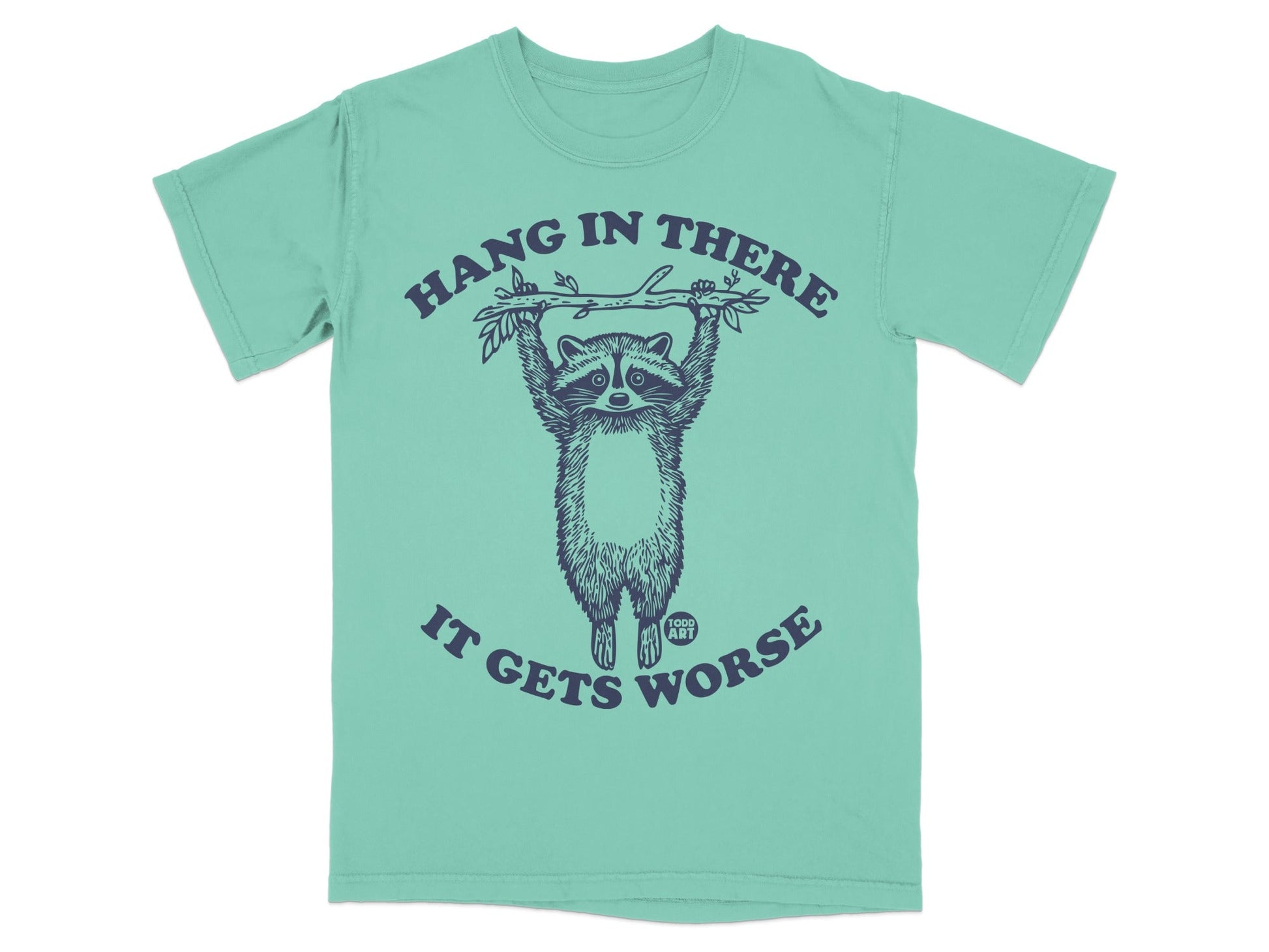 T-shirt with raccoon hanging from branch, "Hang in there it gets worse" text.