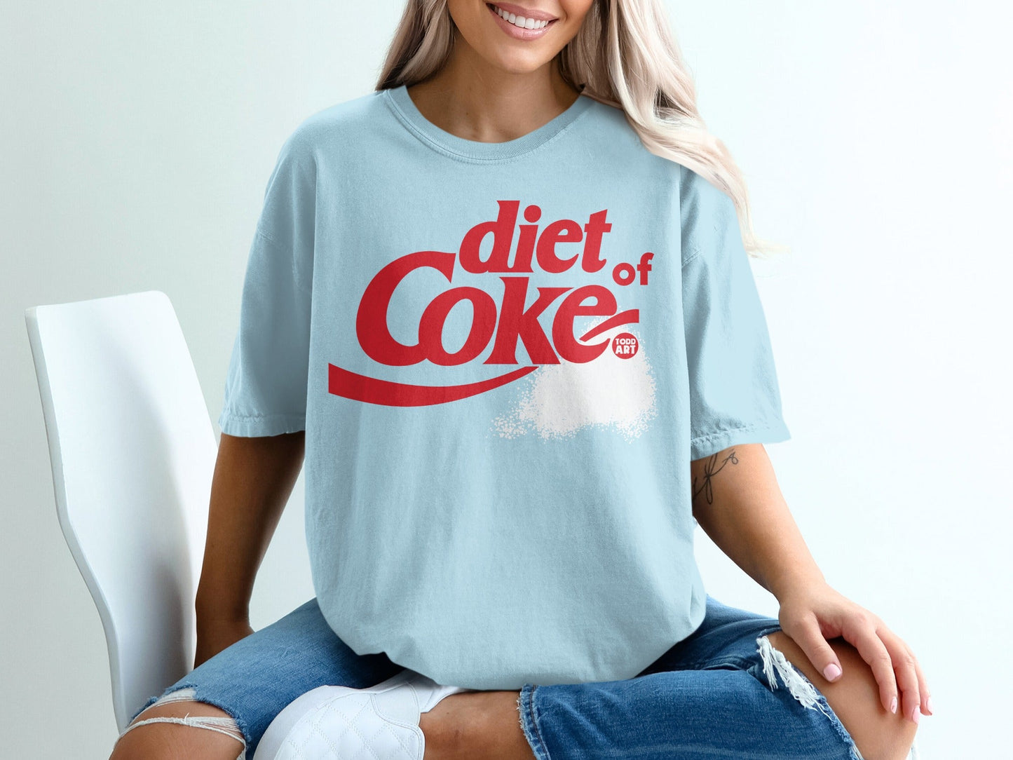 Light blue t-shirt with "diet of Coke" logo and white powder graphic.