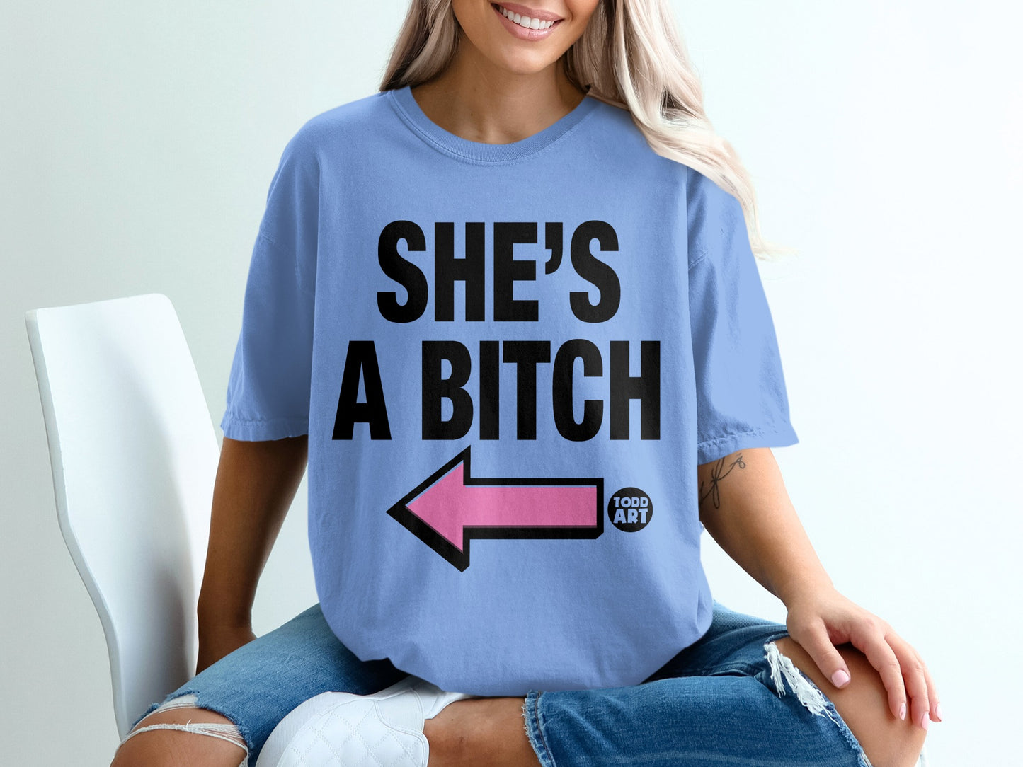 Humorous Blue Tee SHE'S A BITCH Pink Arrow TODD ART product type