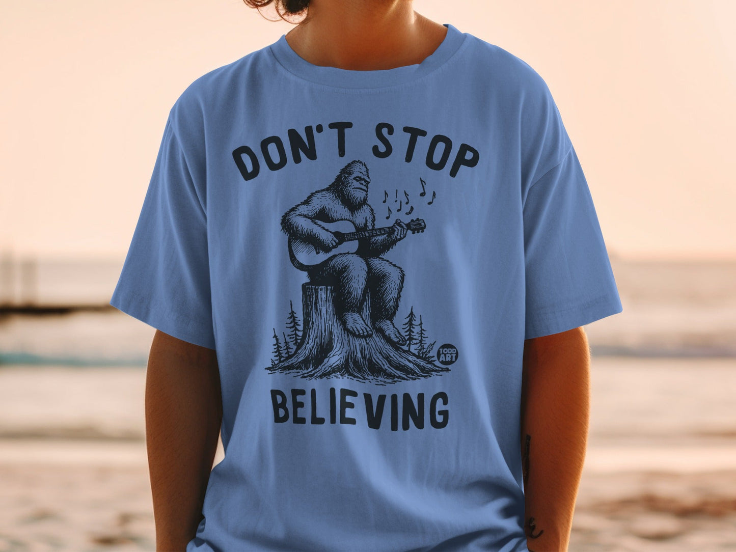 Don't Stop Believing Sasquatch Guitar Graphic Tee