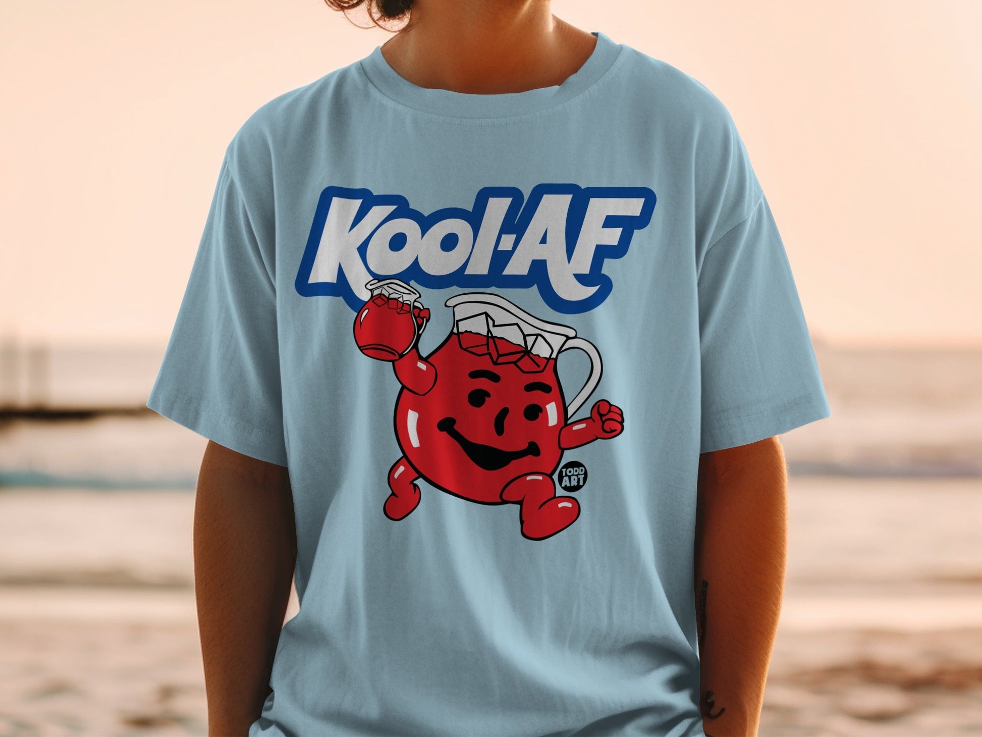 Light blue t-shirt with Kool-Aid Man graphic and "Kool-AF" text.