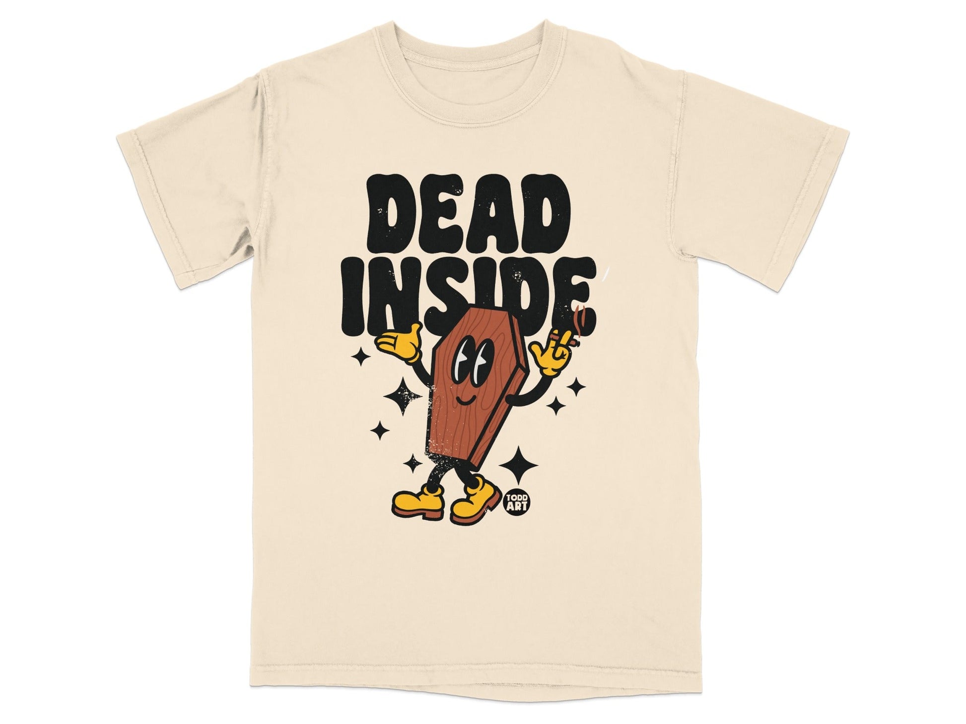Cream t-shirt with cartoon coffin saying "DEAD INSIDE" and holding a cigarette.