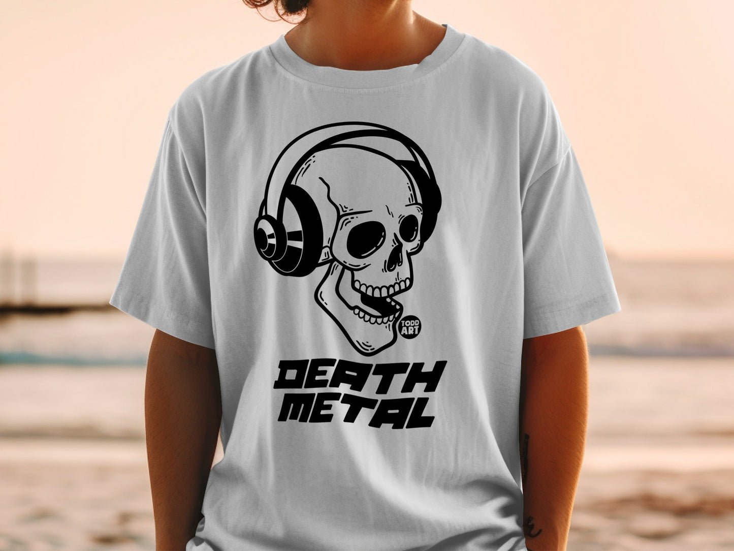 T-shirt featuring a skull with headphones and the words "DEATH METAL".