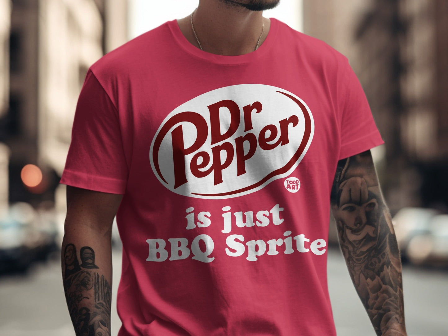 Red t-shirt with Dr Pepper logo and "is just BBQ Sprite" text.