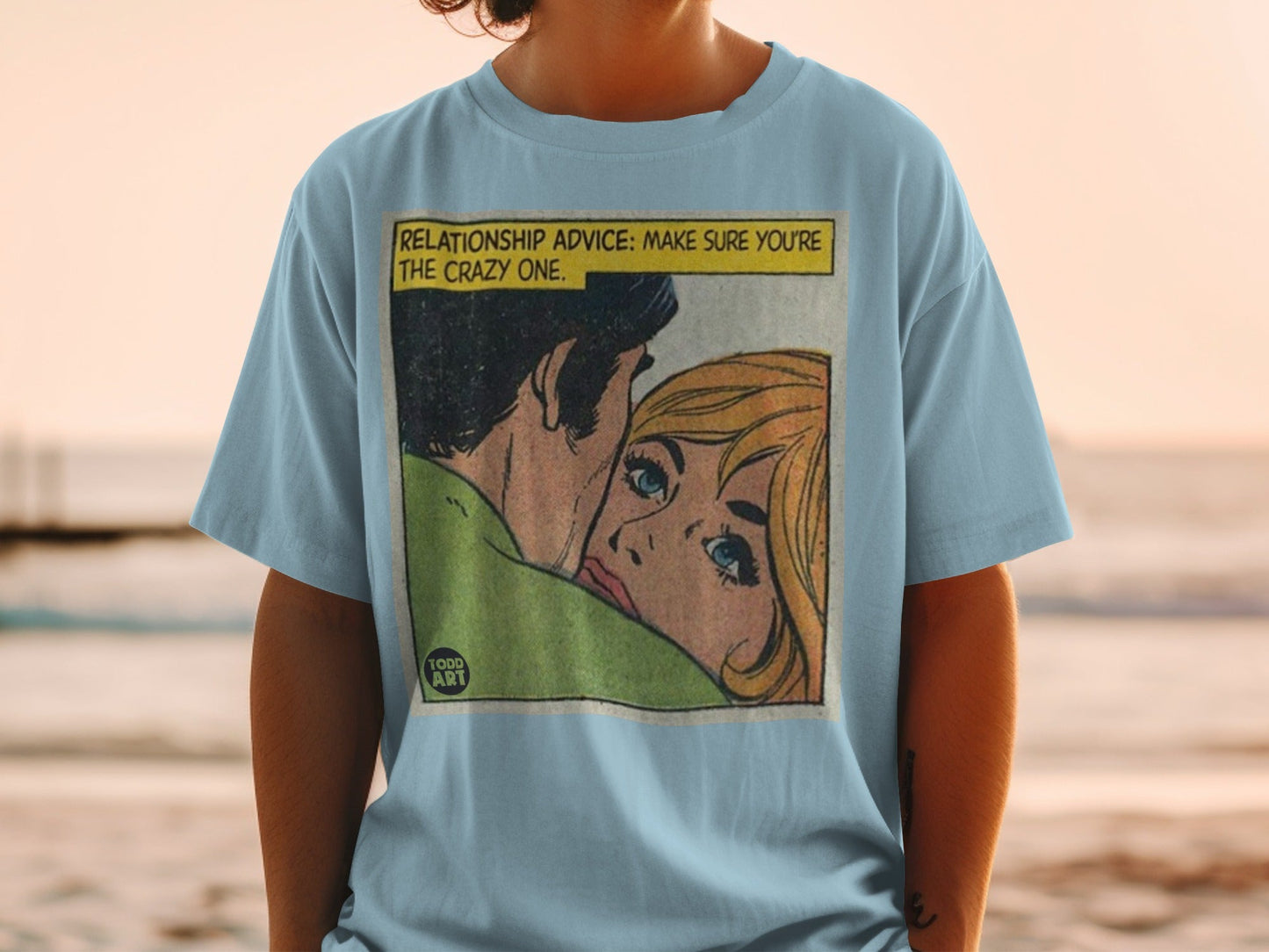Light blue t-shirt with comic art: "RELATIONSHIP ADVICE: MAKE SURE YOU'RE THE CRAZY ONE."