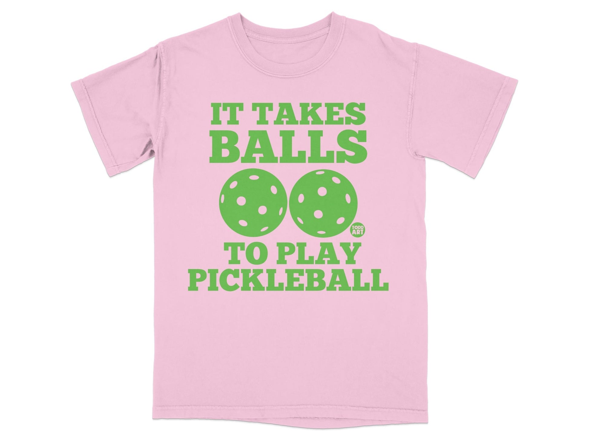 Pink t-shirt with "IT TAKES BALLS TO PLAY PICKLEBALL" and two pickleballs.