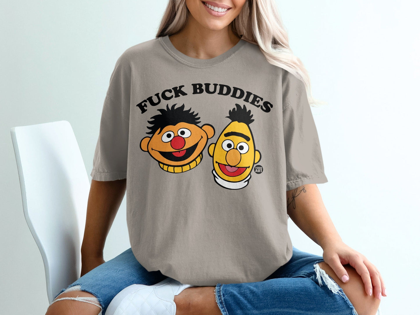 T-shirt with cartoon heads of Ernie and Bert with "FUCK BUDDIES" text.