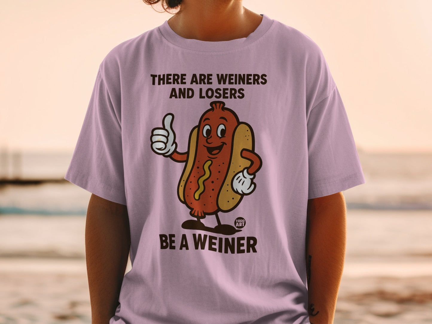 T-shirt with cartoon hot dog giving thumbs up, "THERE ARE WEINERS AND LOSERS BE A WEINER".