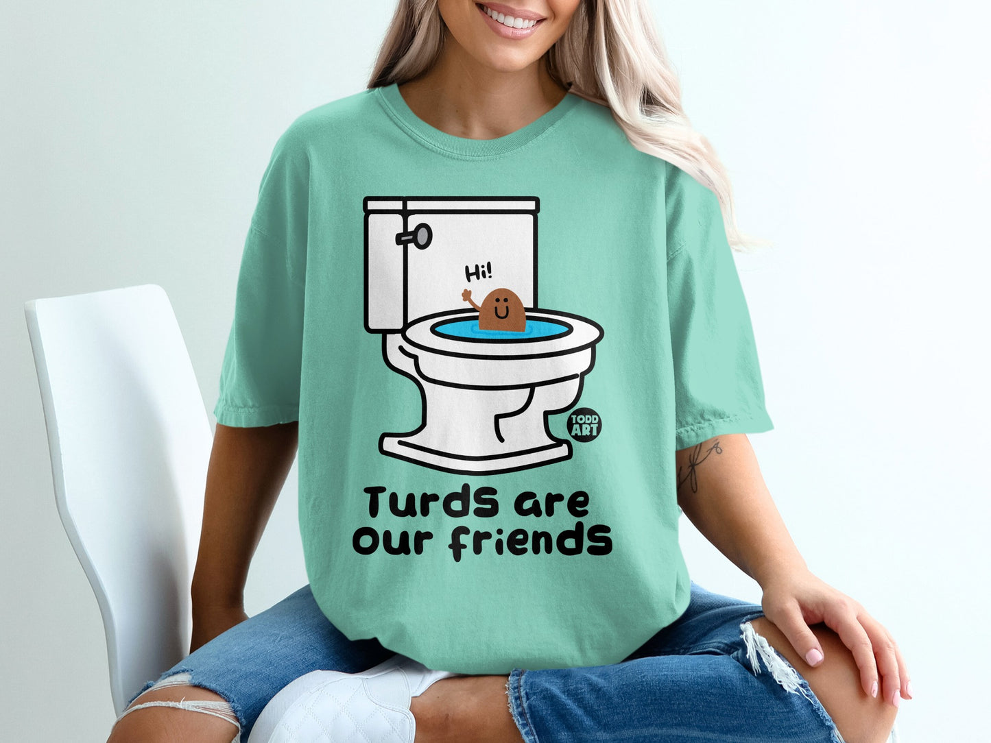 T-shirt with cartoon toilet, brown turd saying "Hi!", and "Turds are our friends" text.