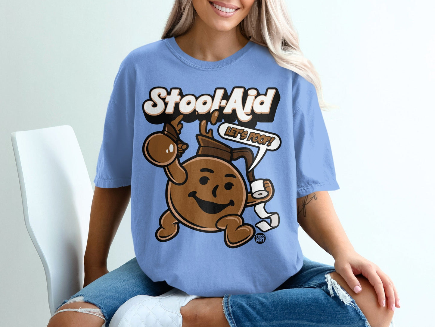 Stool-Aid cartoon character holding toilet paper and juice box, saying "Let's Poop!"