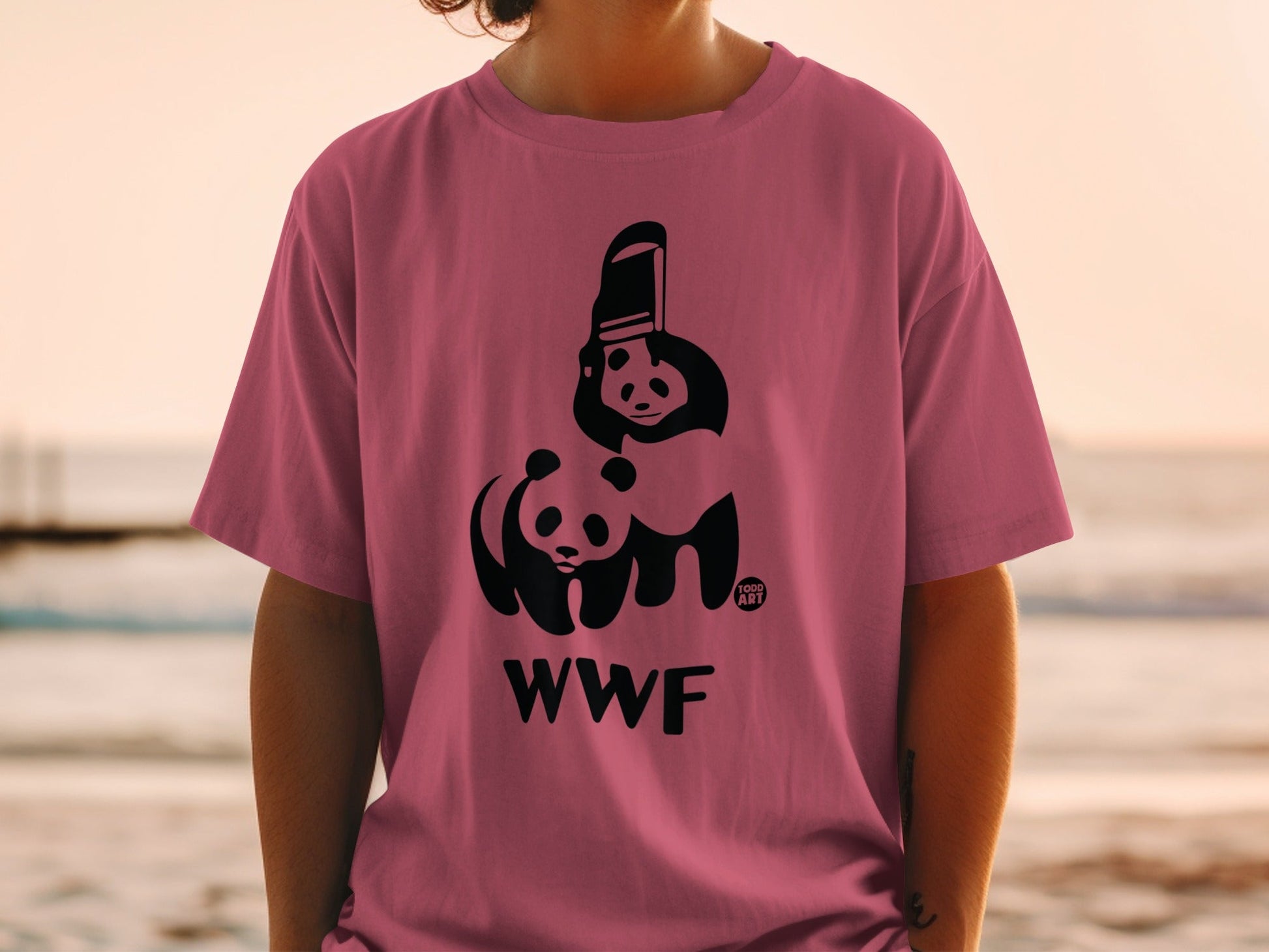 Pink t-shirt with WWF panda logo and text.