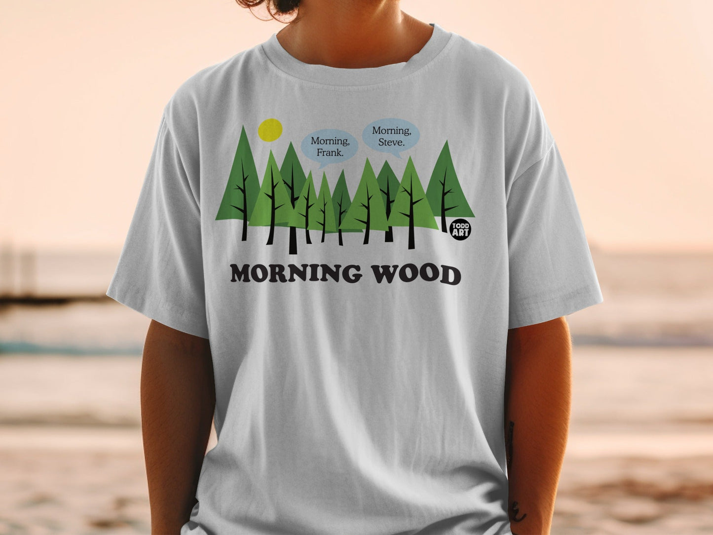White t-shirt with trees and "Morning Wood" text, featuring cartoon speech bubbles.