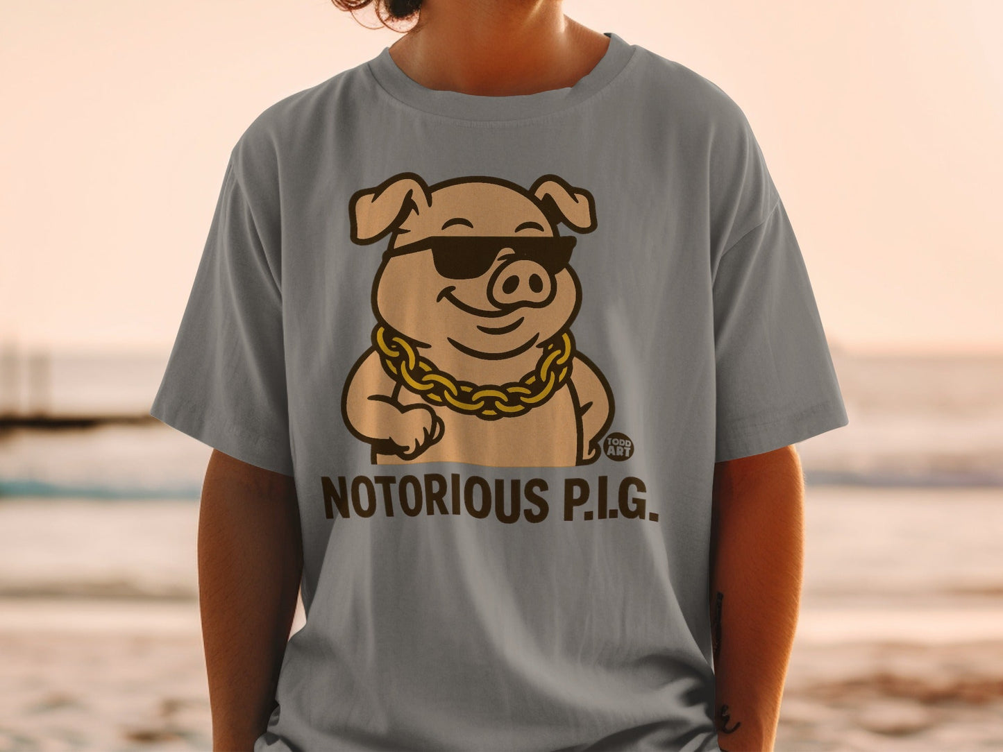Cartoon pig wearing sunglasses and gold chain, text Notorious P.I.G.