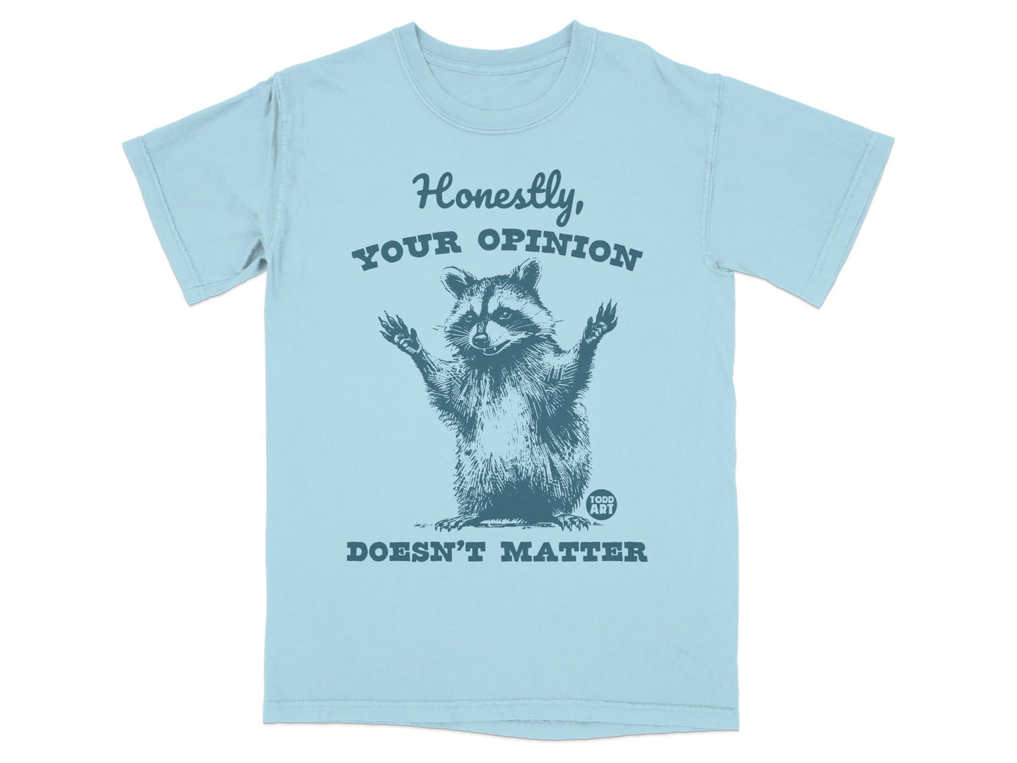Light blue t-shirt with raccoon and text "Honestly, YOUR OPINION DOESN'T MATTER".