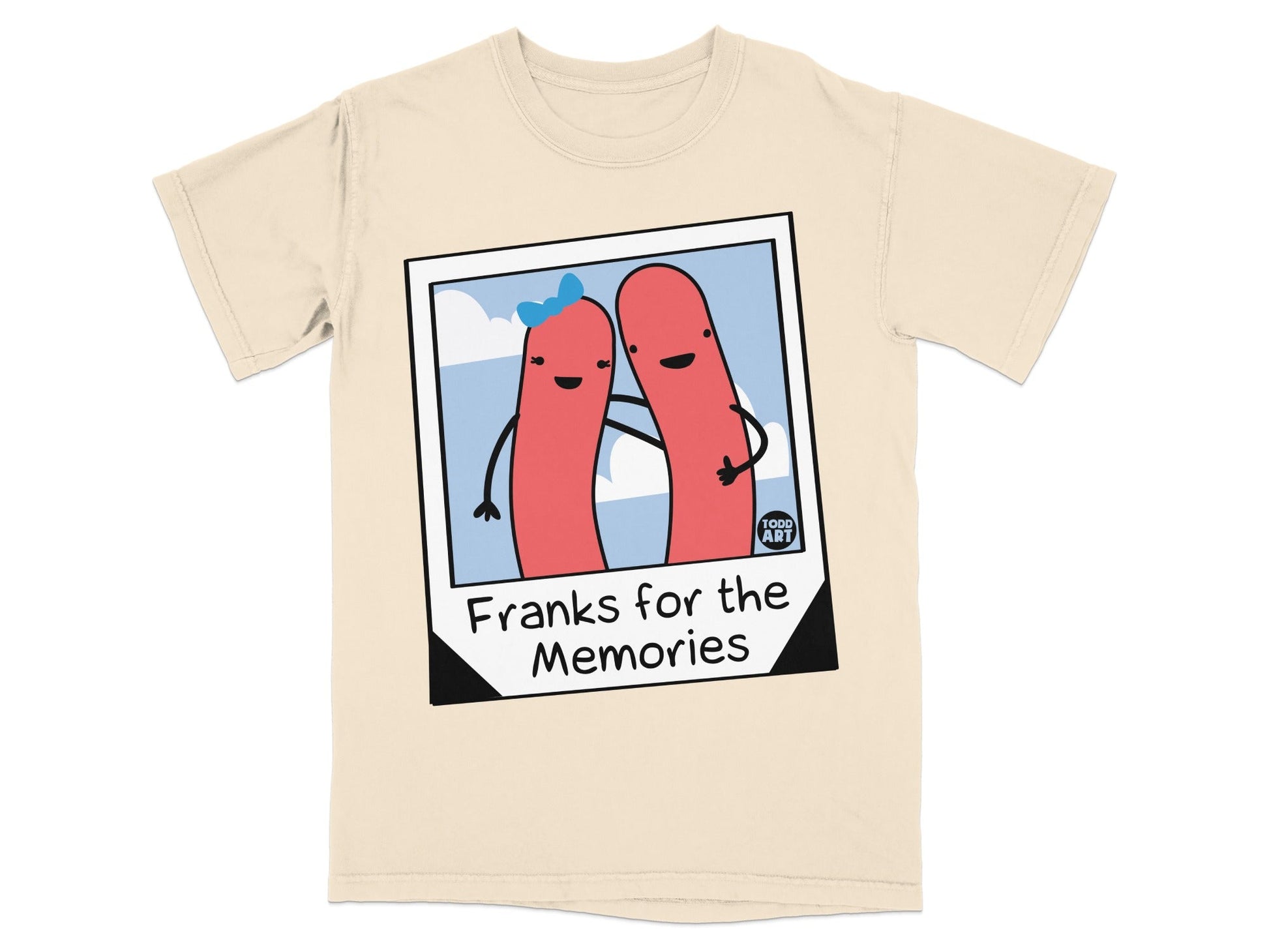 T-shirt with cartoon hot dogs and "Franks for the Memories" text.