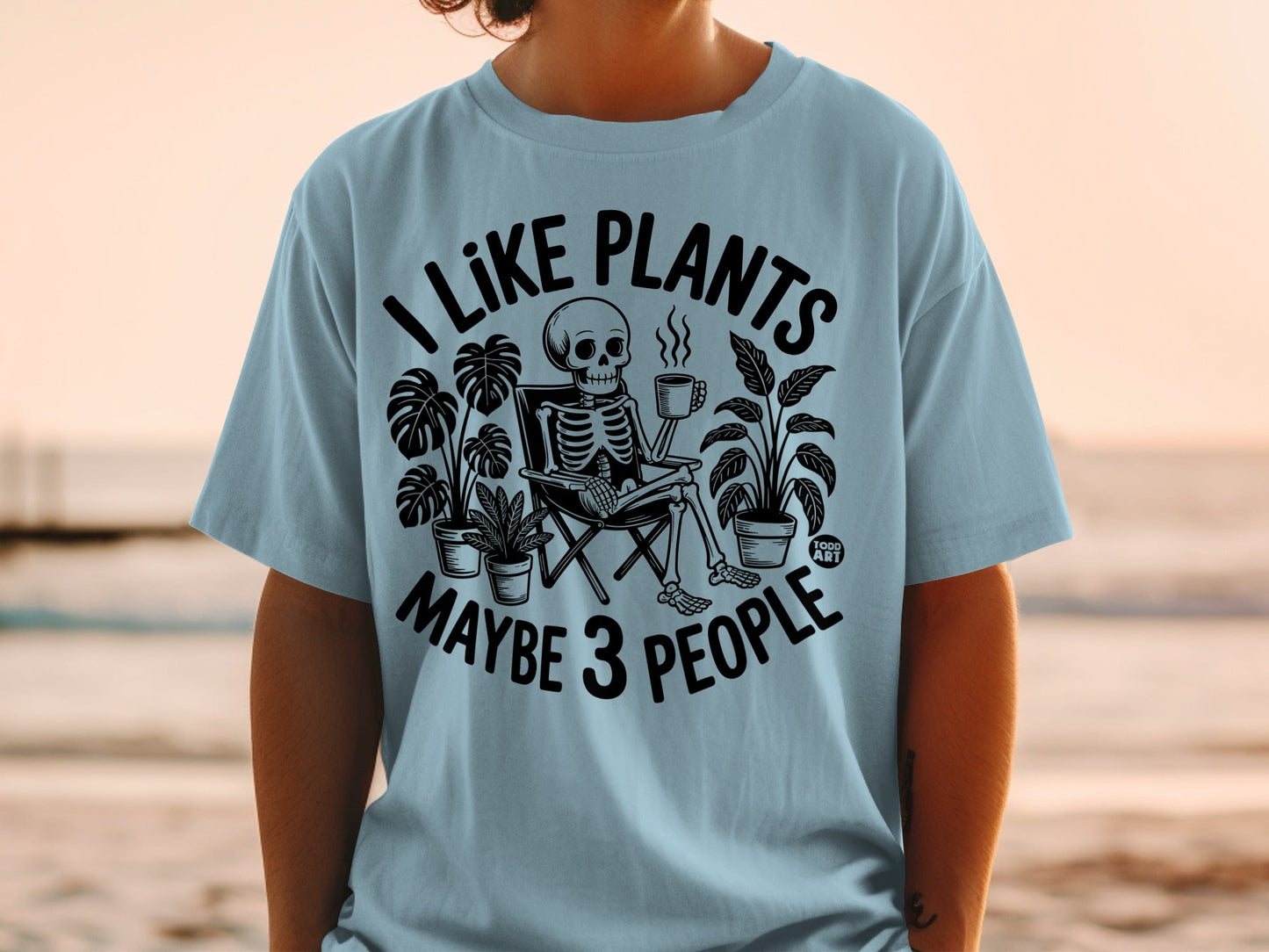Skeleton sitting in chair with plants, drinking coffee.