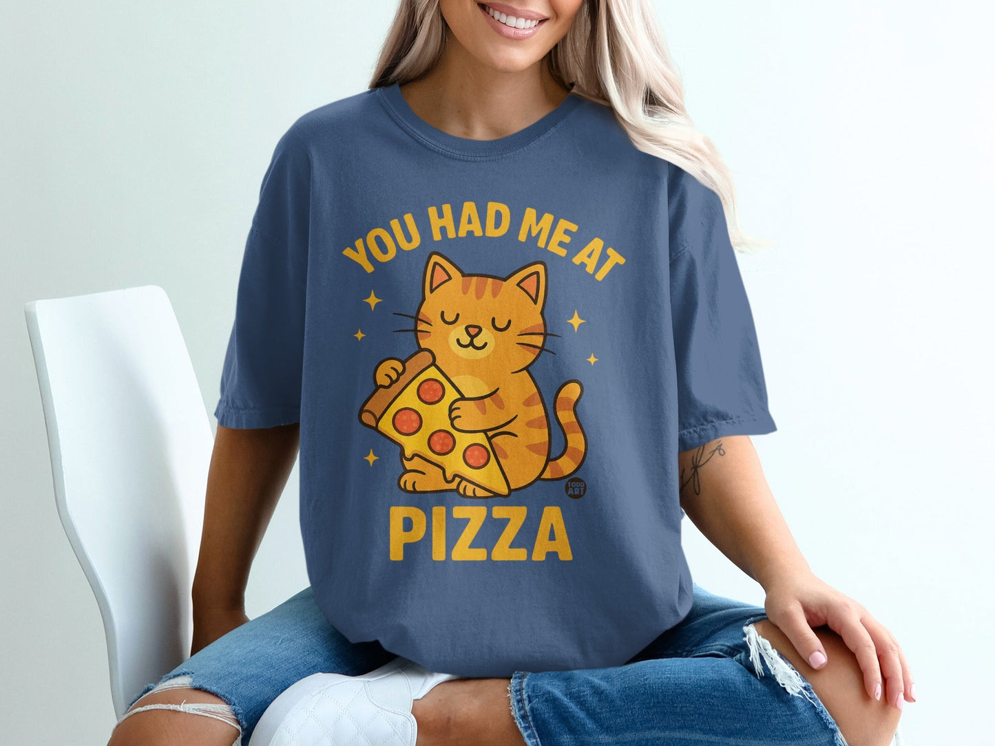 Blue t-shirt with "You had me at pizza" and a cat holding a slice.