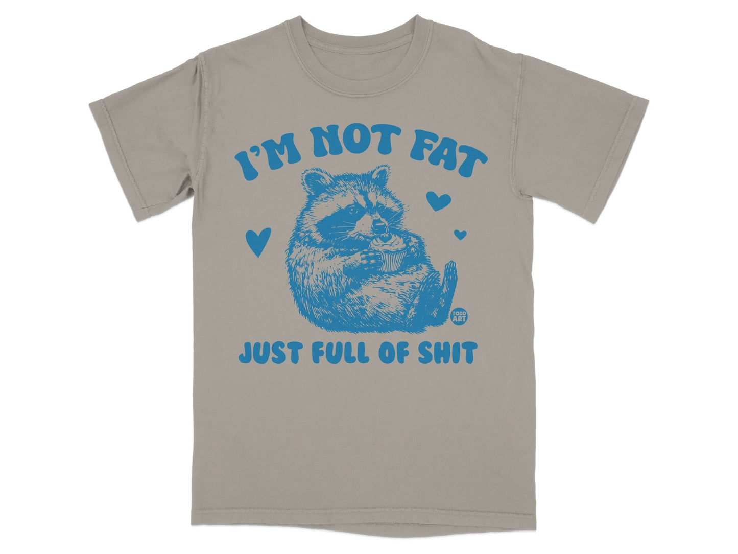 T-shirt with blue raccoon graphic and text "I'm not fat just full of shit."
