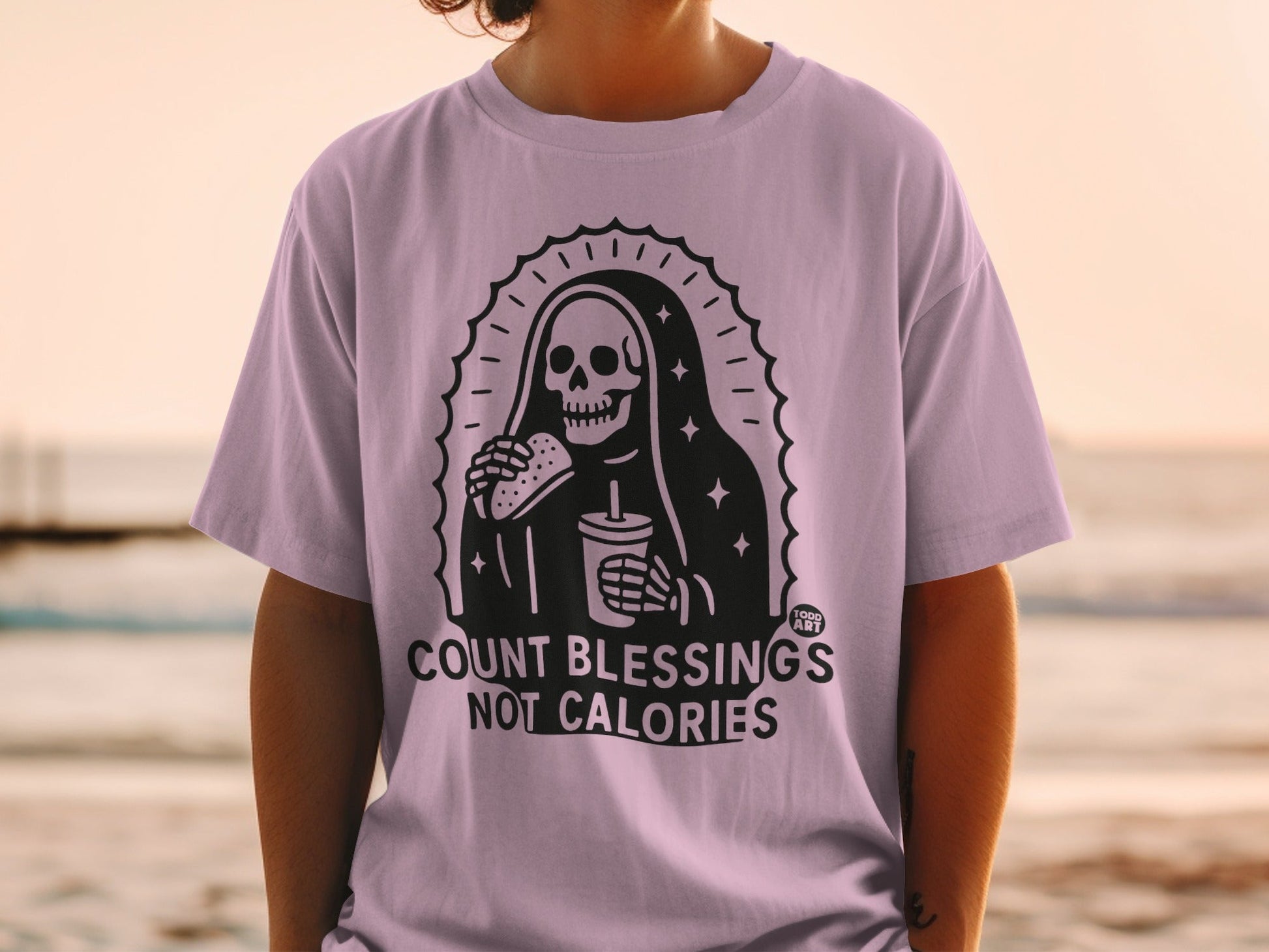 Skeleton in nun's habit eating burger and drink, "Count Blessings Not Calories."