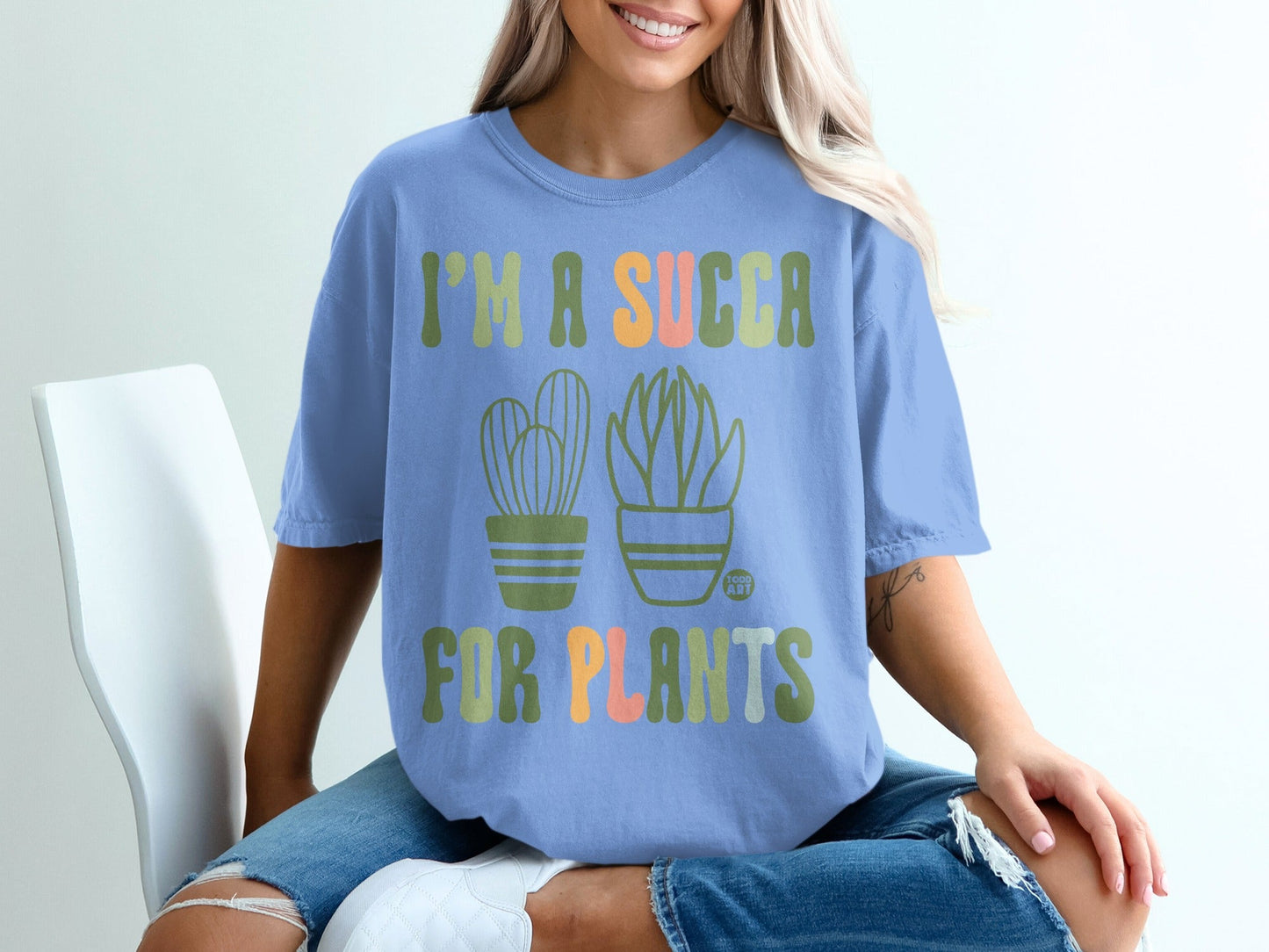 Blue t-shirt with "I'm a succa for plants" text and two potted succulents.