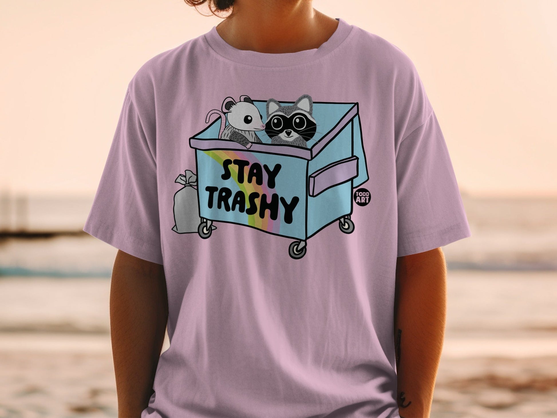 Trash panda and mouse in dumpster with "STAY TRASHY" text.