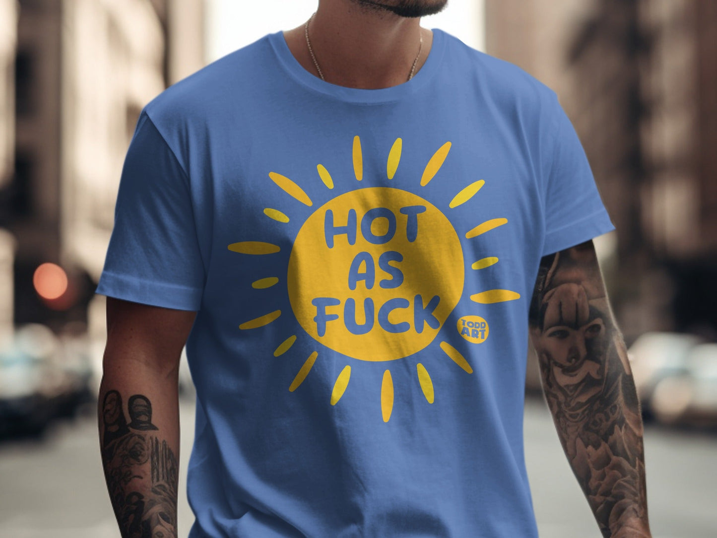 Blue t-shirt with yellow sun graphic and text "HOT AS FUCK".