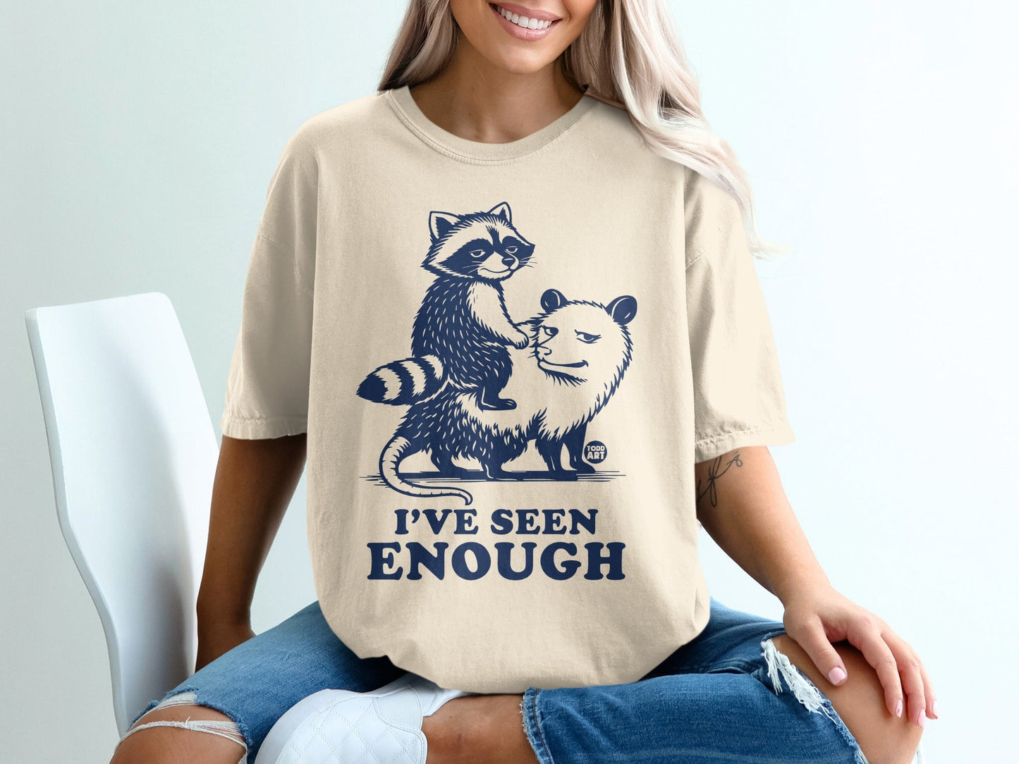 T-shirt with raccoon riding an opossum and text "I'VE SEEN ENOUGH".