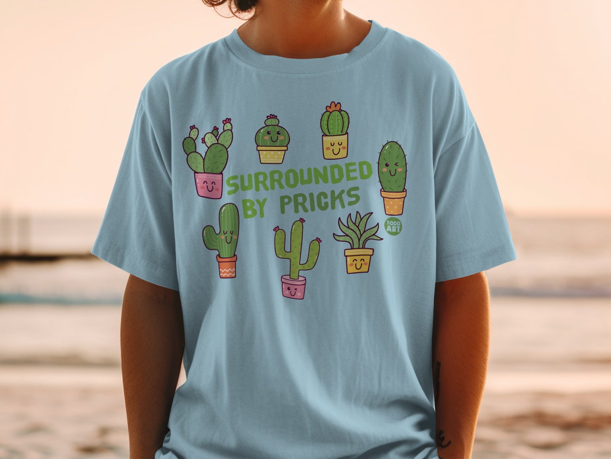 Surrounded by Pricks Funny Cactus Graphic Tee Shirt