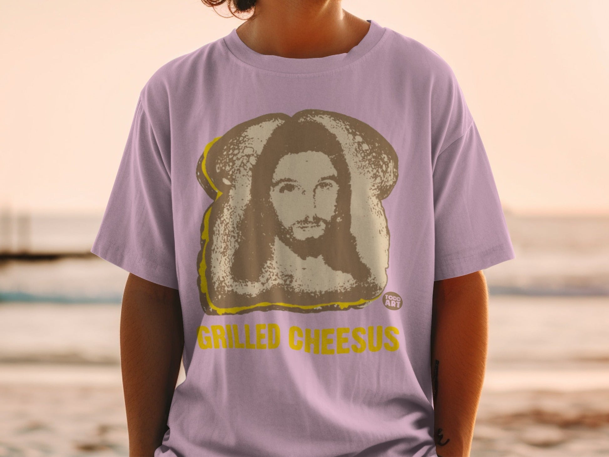 T-shirt with grilled cheese sandwich resembling Jesus' face.