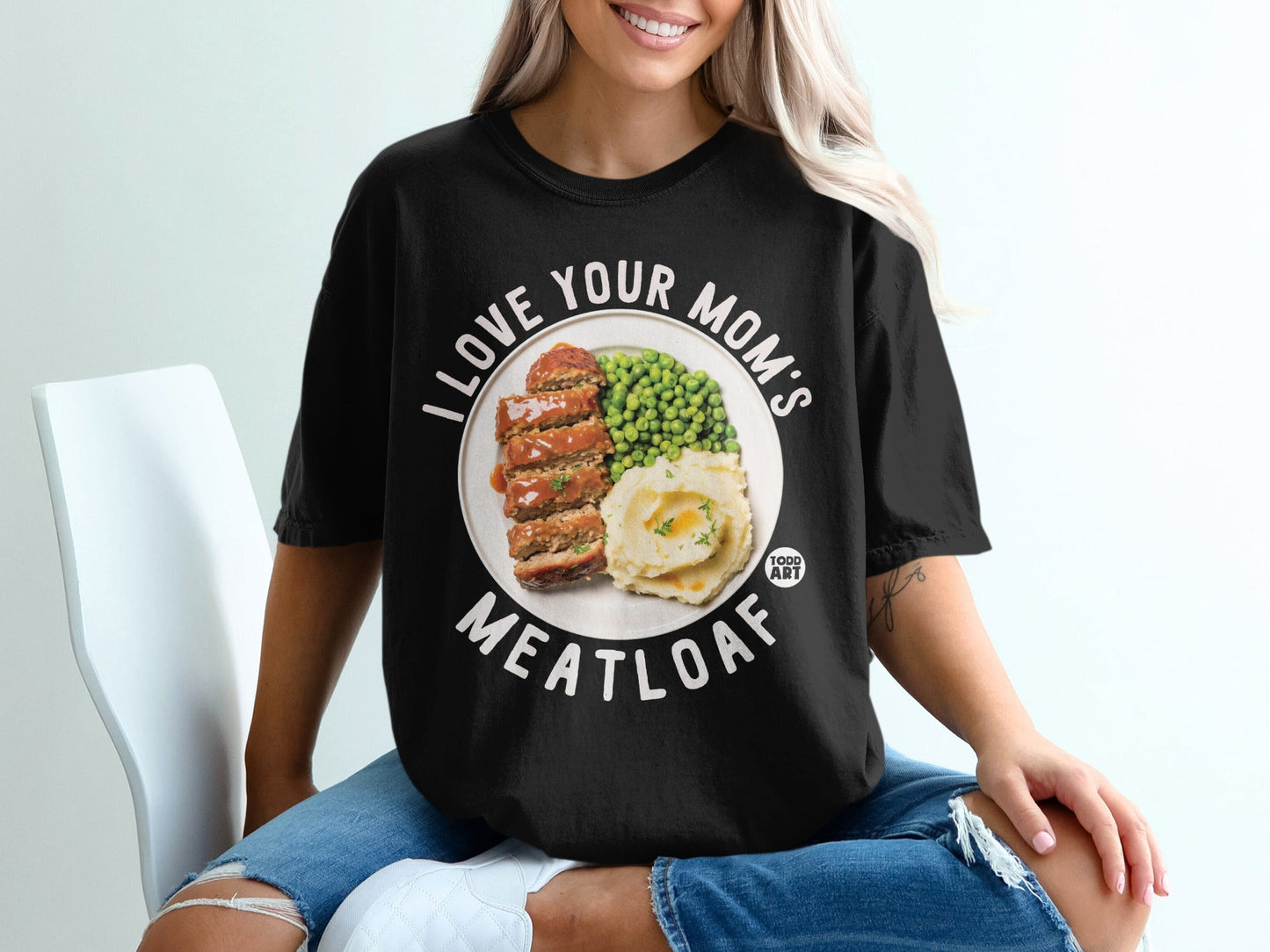 Black t-shirt with "I LOVE YOUR MOM'S MEATLOAF" and meatloaf on a plate.