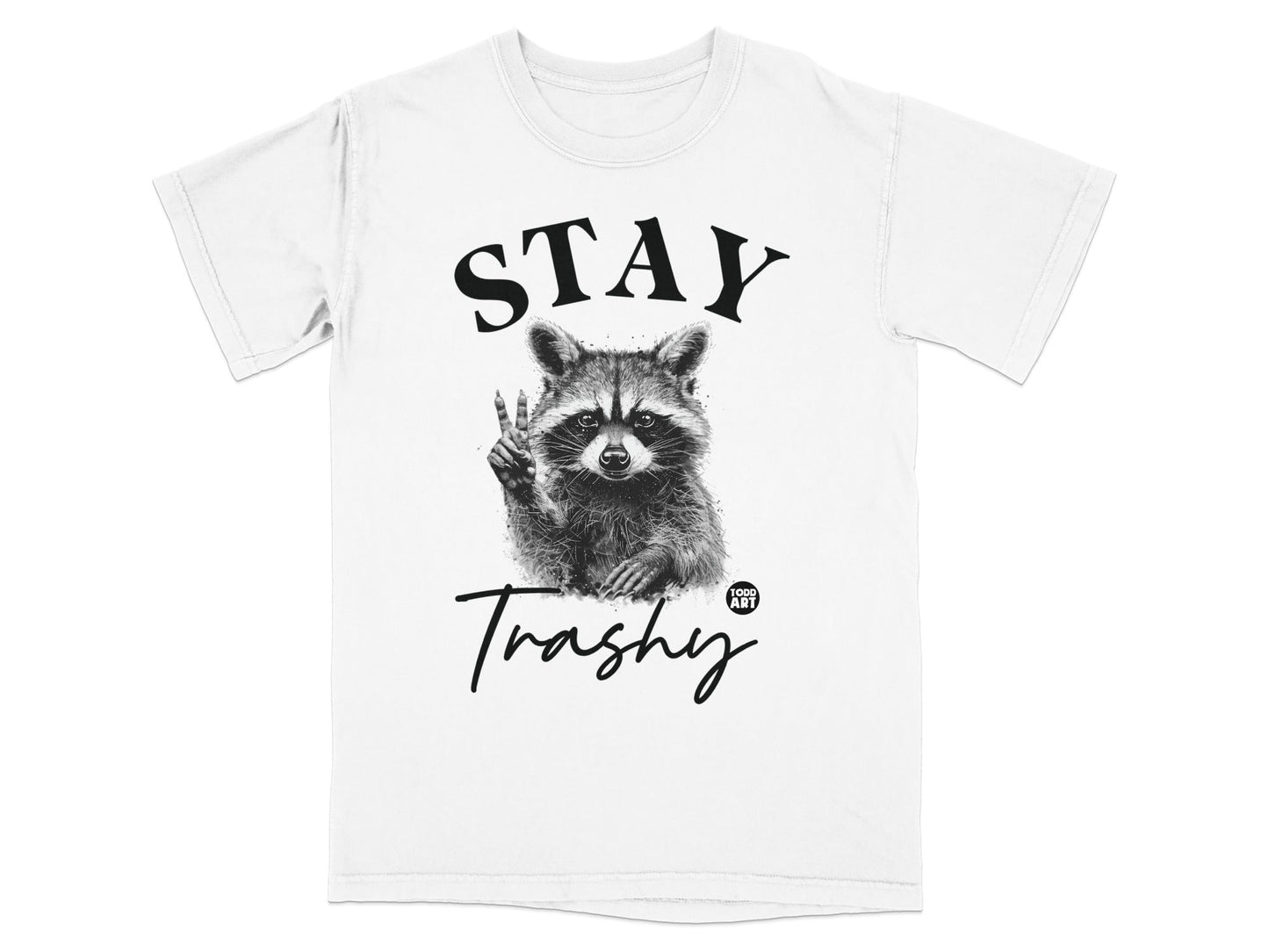 White t-shirt with raccoon giving peace sign and "Stay Trashy" text.