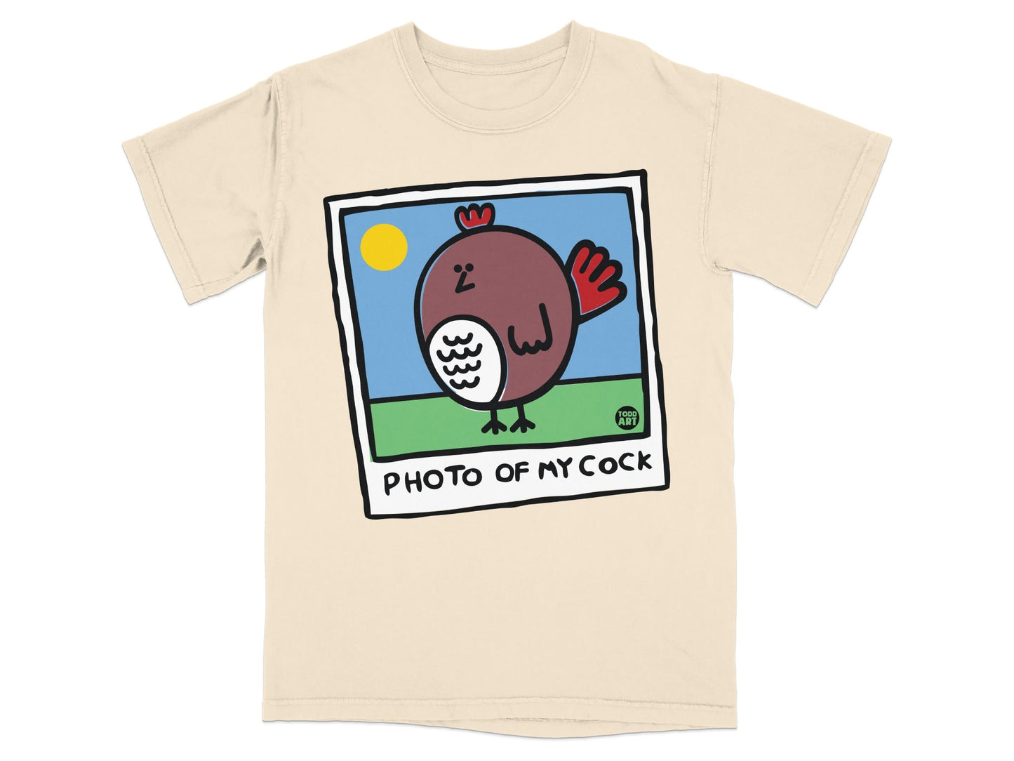 Cream t-shirt with a cartoon rooster illustration and the text "PHOTO OF MY COCK".