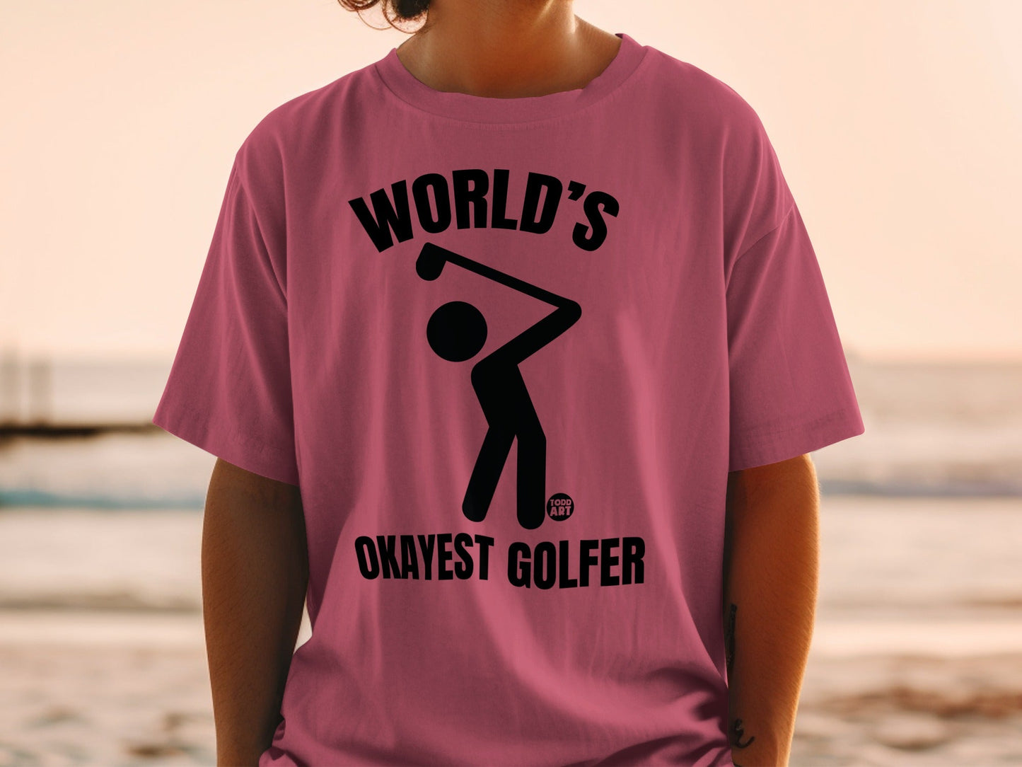T-shirt with a golfer graphic and text "World's Okayest Golfer".
