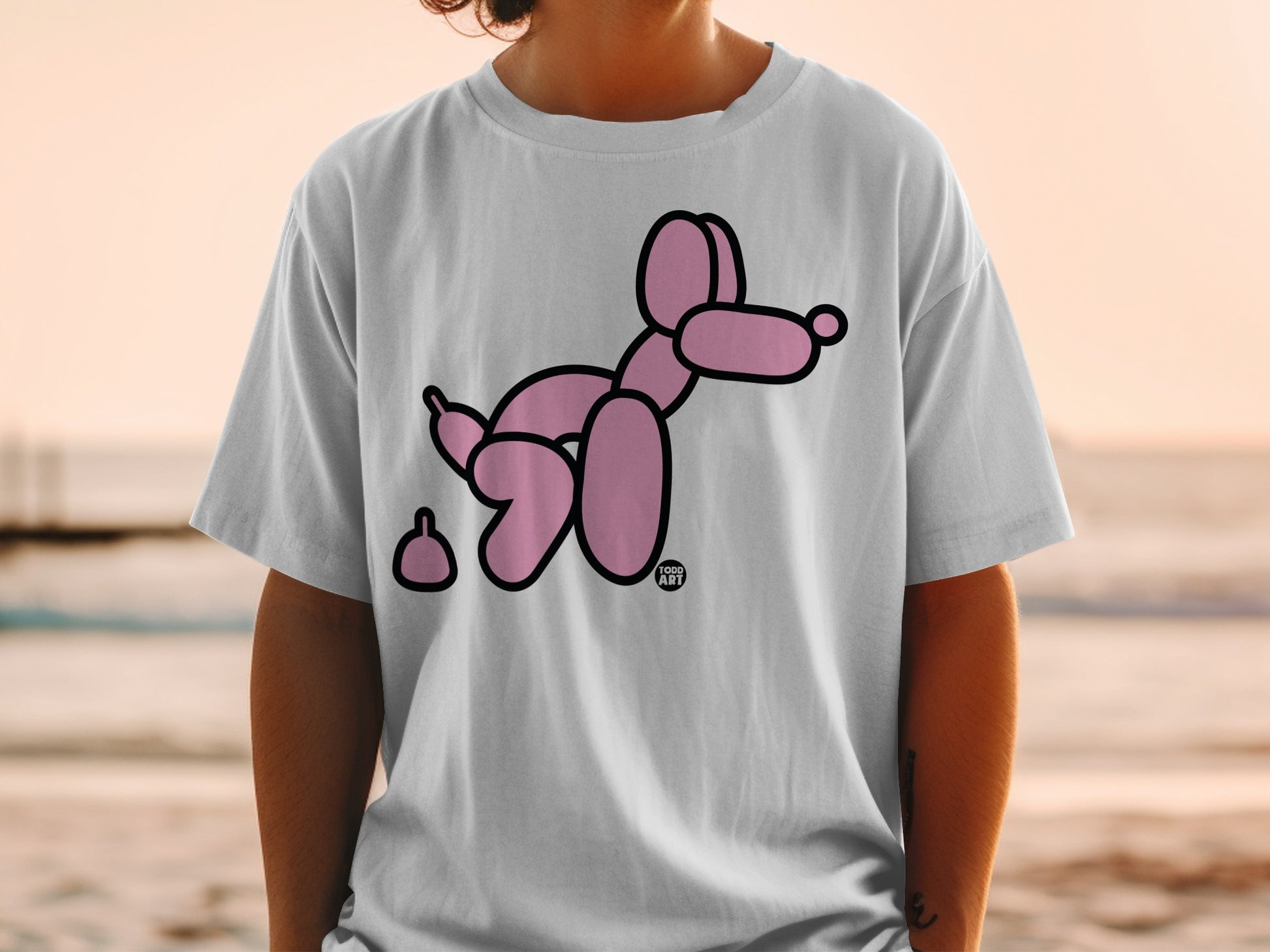 Pink balloon dog t-shirt design with a brown poop emoji.