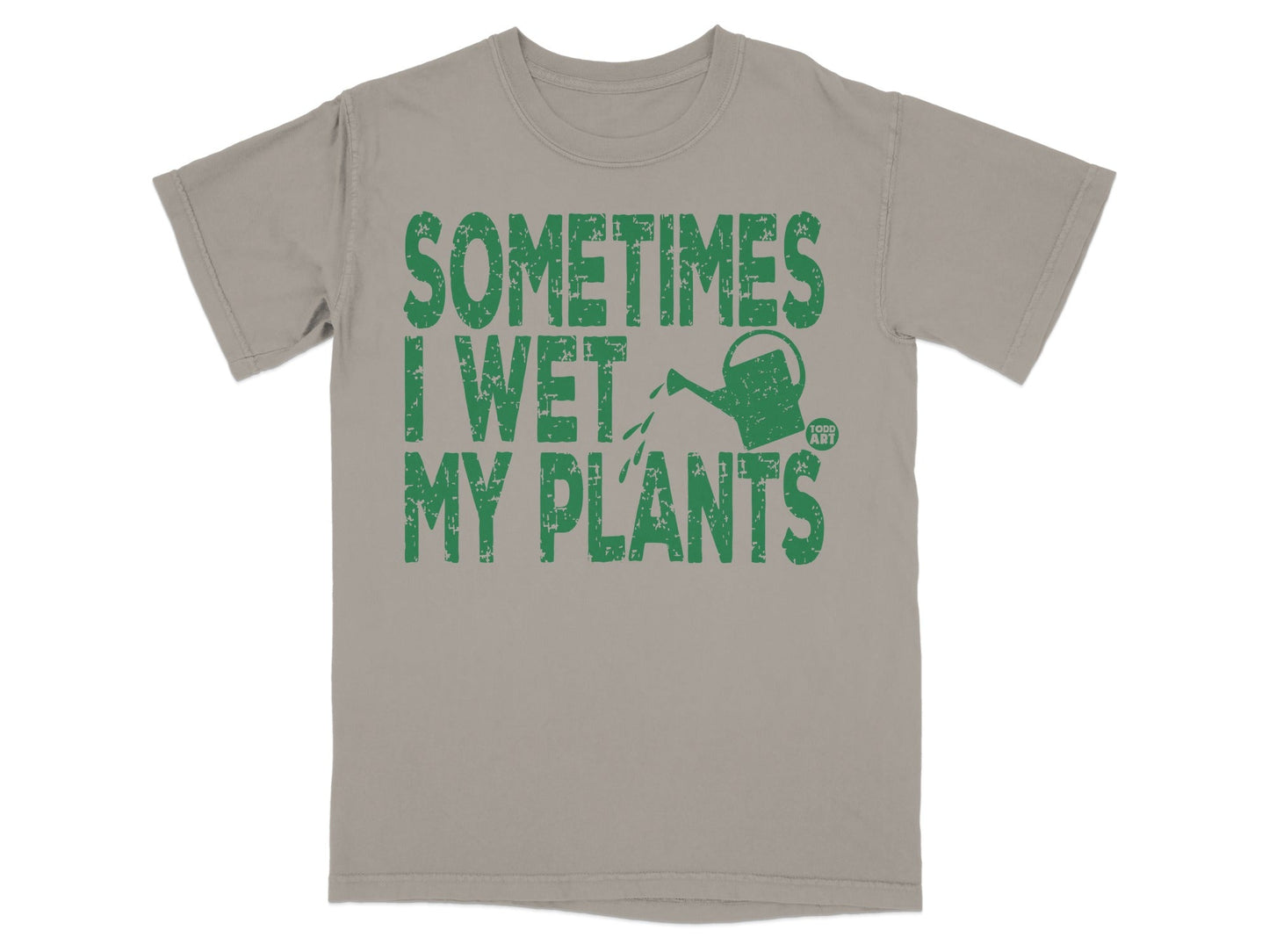 T-shirt with green text "SOMETIMES I WET MY PLANTS" and a watering can.