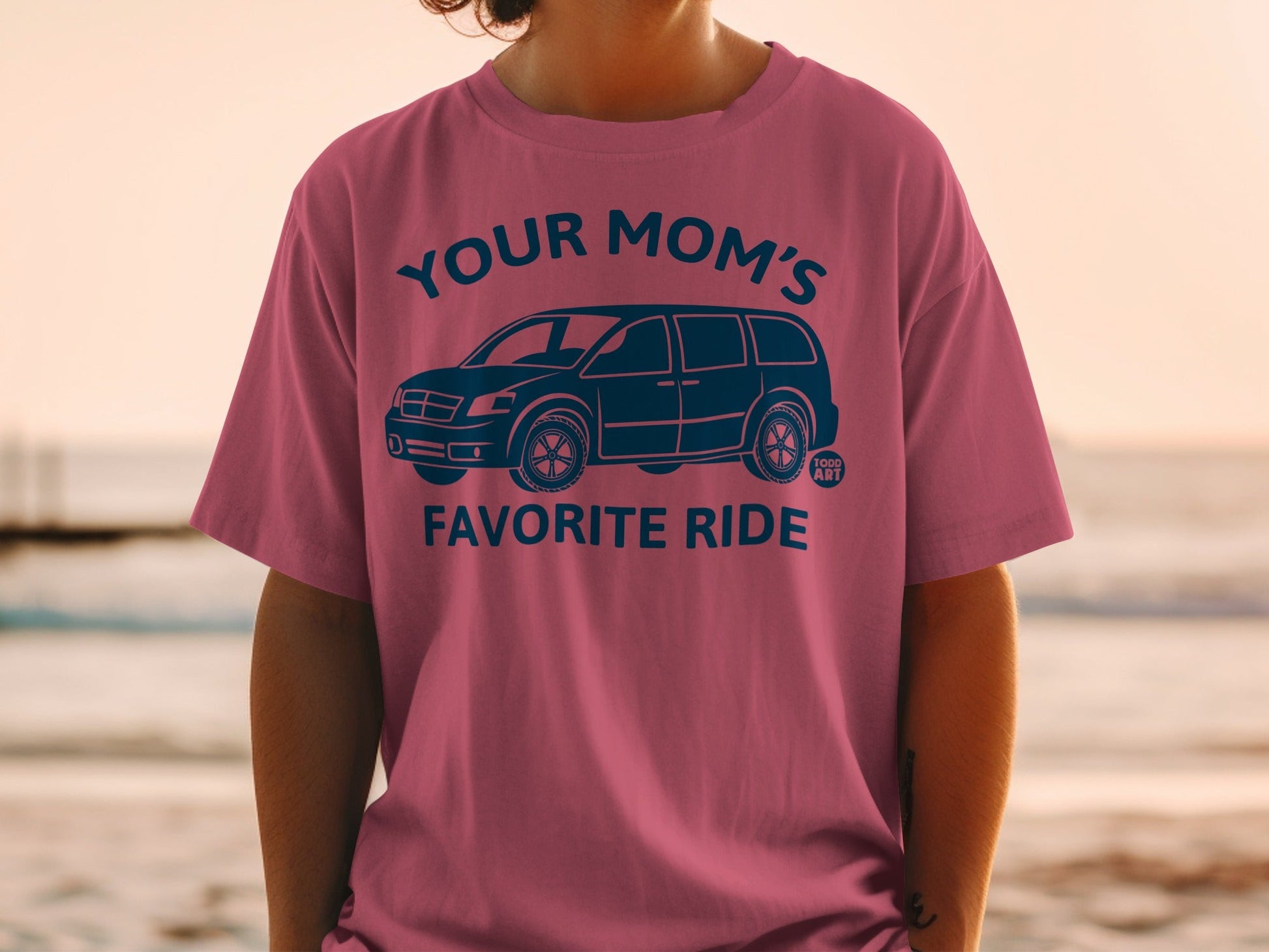 T-shirt with "YOUR MOM'S FAVORITE RIDE" text and minivan graphic.