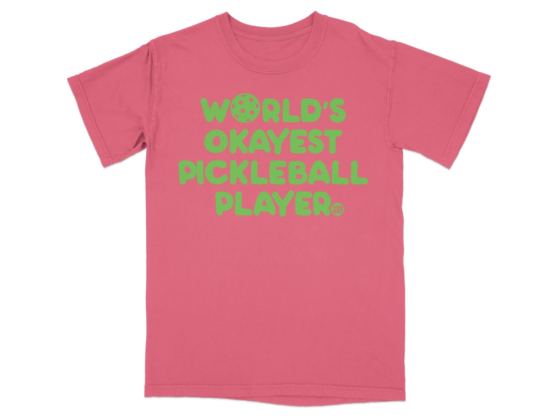 Pink t-shirt with "WORLD'S OKAYEST PICKLEBALL PLAYER" in green text.