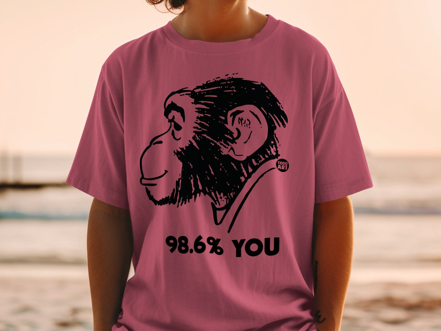 T-shirt with a black monkey graphic and text "98.6% YOU".
