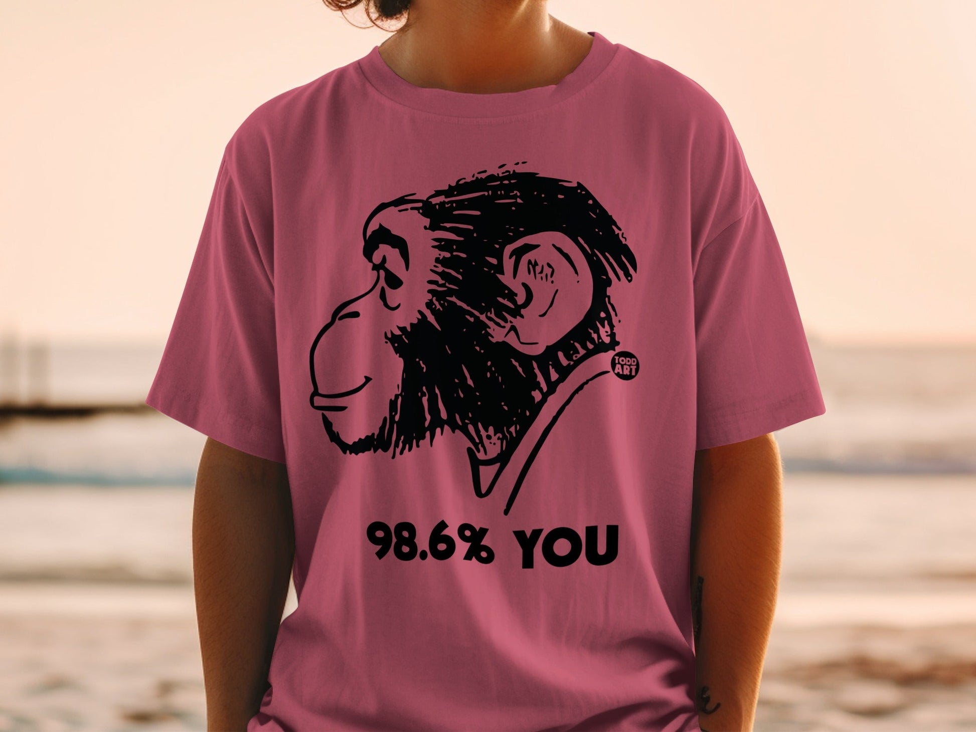T-shirt with a black monkey graphic and text "98.6% YOU".