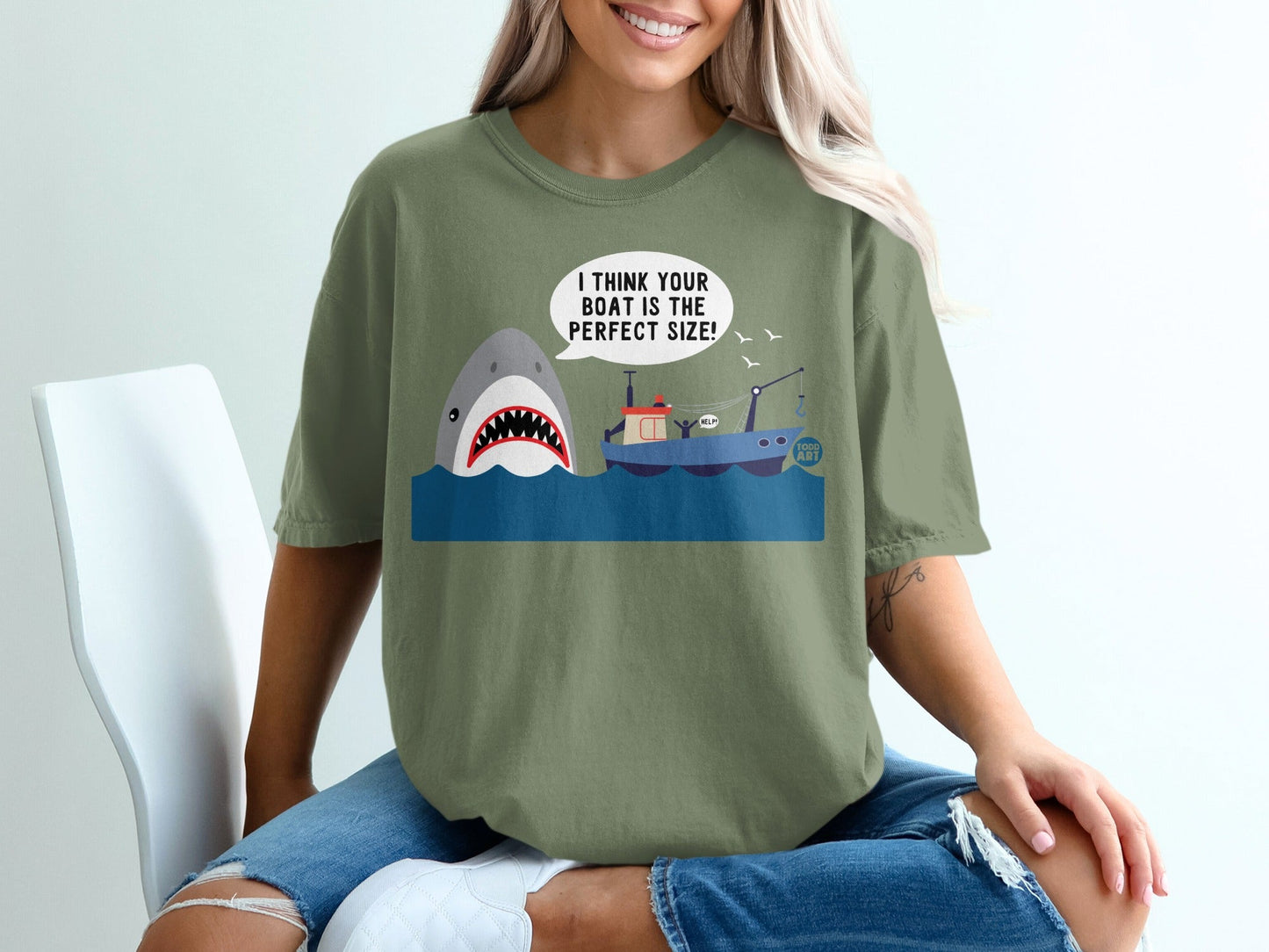 Cartoon shark near boat saying "Help!" with text "Food Art".