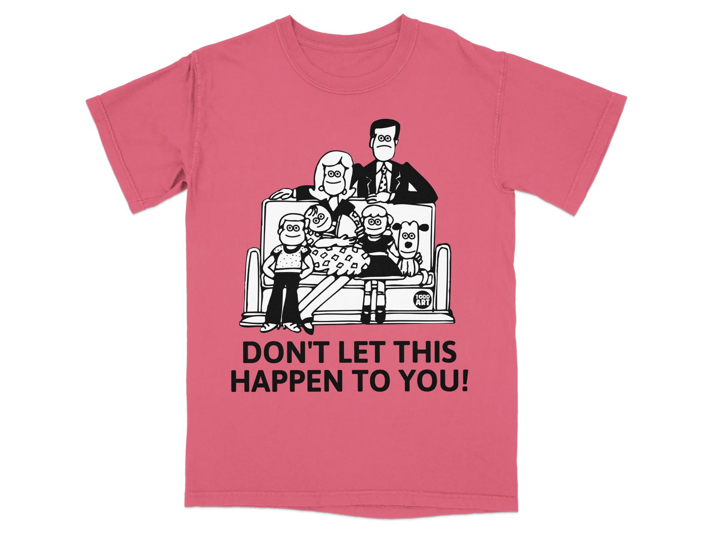 Pink t-shirt with cartoon family and dogs on couch, text "DON'T LET THIS HAPPEN TO YOU!".