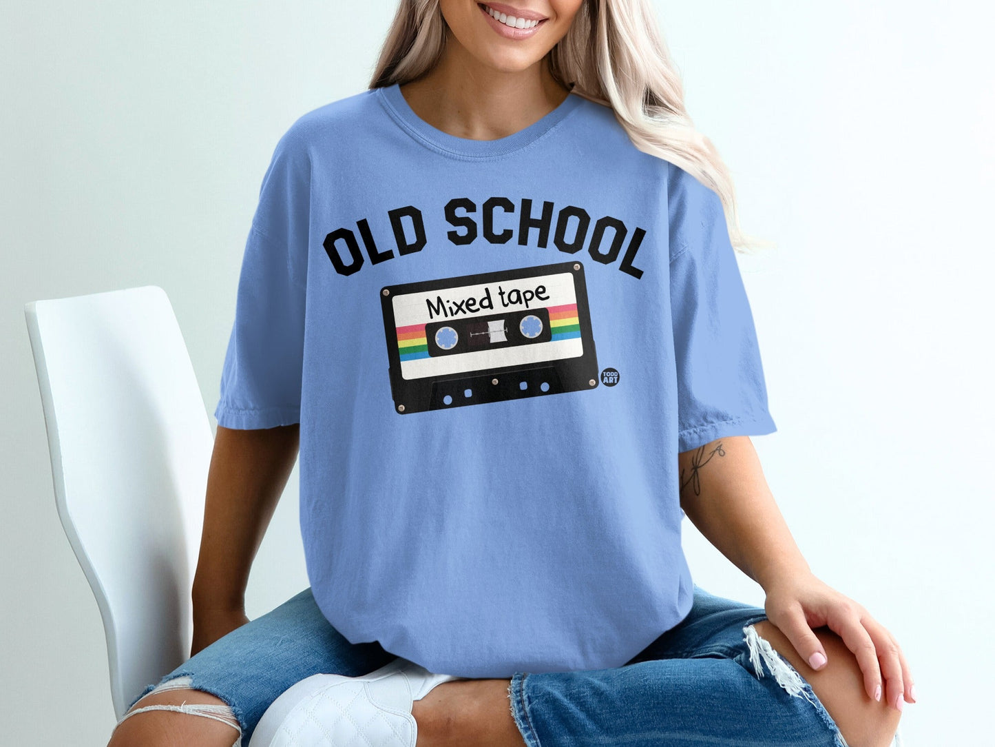 Blue t-shirt with "OLD SCHOOL" and cassette tape graphic.